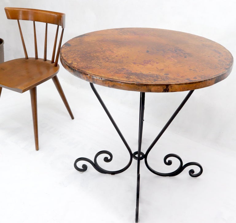 Hammered Coper Top Wrought Iron Base Round Dining Dinette Cafe Table In Good Condition For Sale In Rockaway, NJ