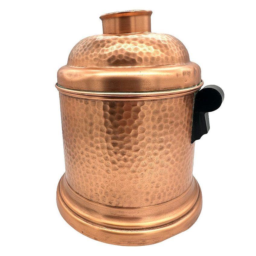 Art Deco era humidor features a hand-hammered copper exterior, giving it a distinctive appearance with a textured surface.
Inside. It includes Bakelite handles on each, with a side pull air-tight lid, felt bottom, and is signed Revere Rome N.Y