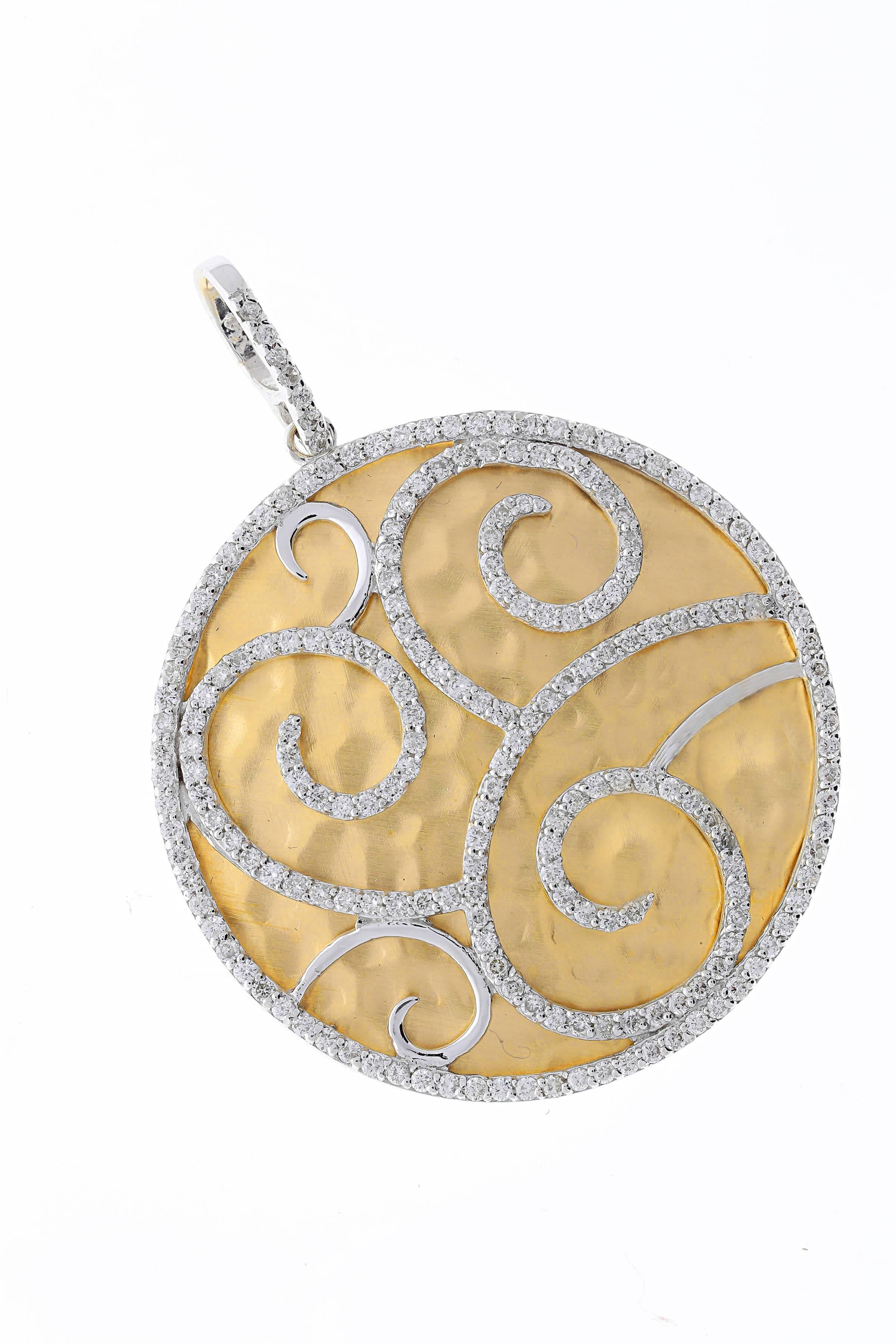 14K round hammered disc pendant with swirl design containing bezel set round diamonds.