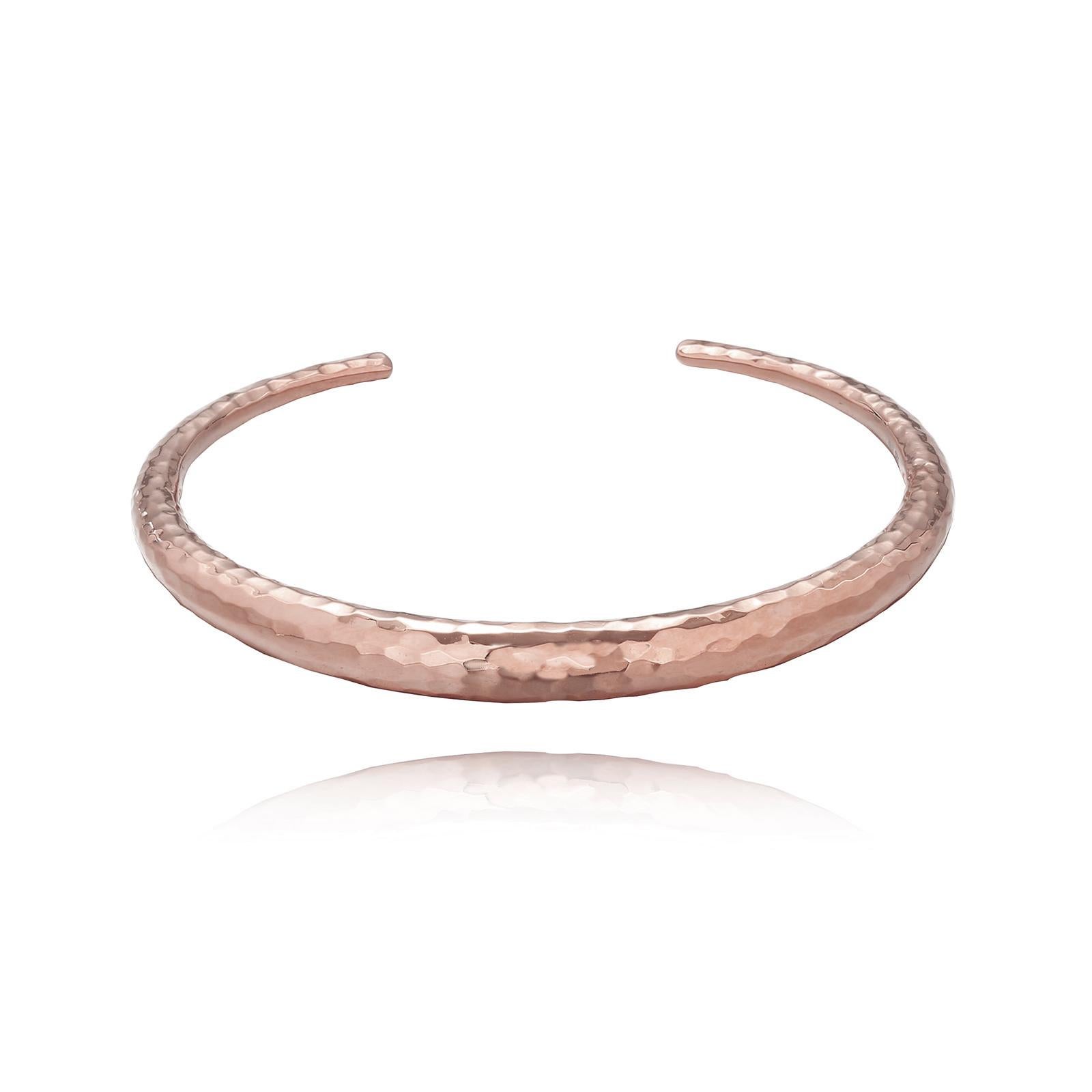 We are fierce and bold. This hammered dome cuff is perfectly transcendable. Wear on its own day and night, or mix and match and stack with other pieces.   .925 sterling silver base. Also available in sterling silver and 24k rose gold vermeil. 
