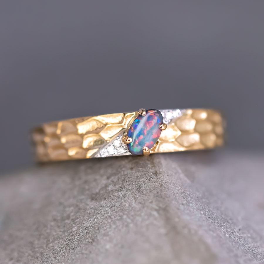 Hammered Finish 18K Yellow Gold Black Opal and Diamond Engagement Wedding Ring Promise Ring.



Design Idea: I discovered this stunning red Lightning Ridge black opal years ago, and now I've crafted it into this exquisite design. The hammered finish