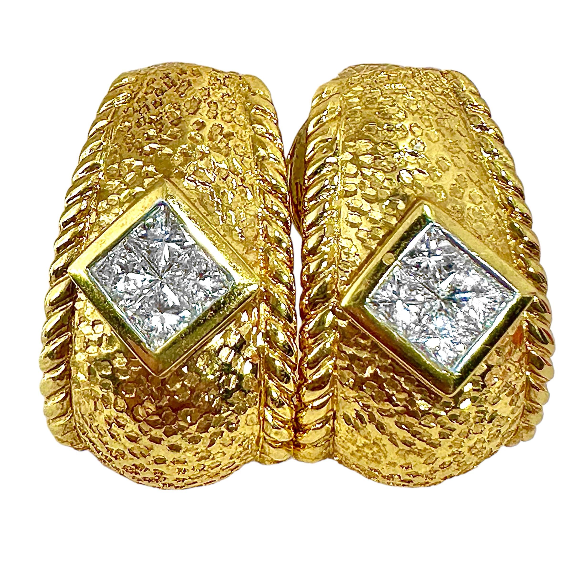 This expertly hammered and bark finish pair of Late-20th Century 18k yellow gold J hoop earrings are as well crafted  as they are striking and beautiful. Deep hammering detail covers the entire center sections of this bombe dome pair, and raised