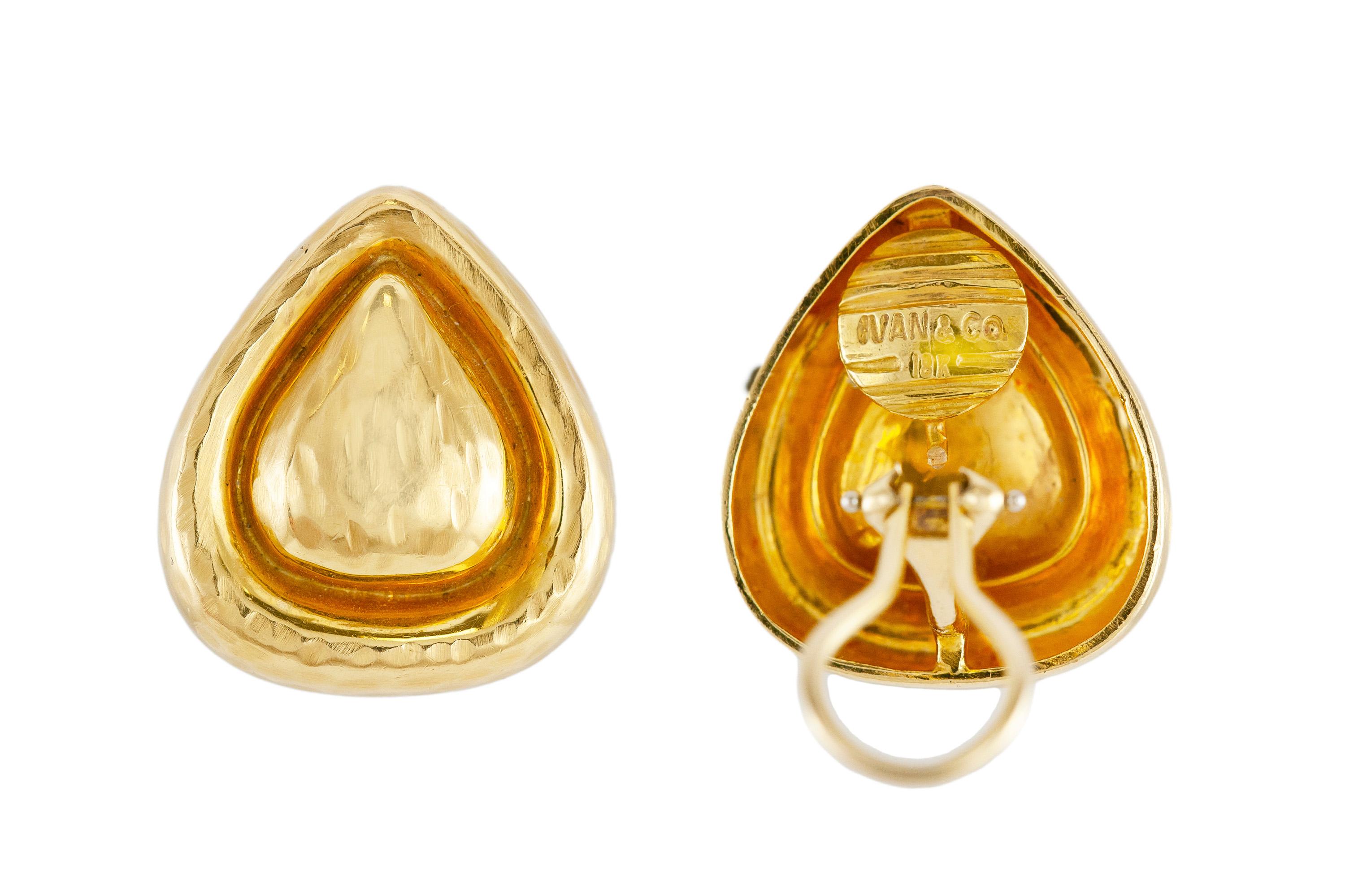 The earrings are finely crafted in 18k hammered yellow gold, weighing 14.3 dwt. Signed by Ivan & Co. 
Circa 1940.