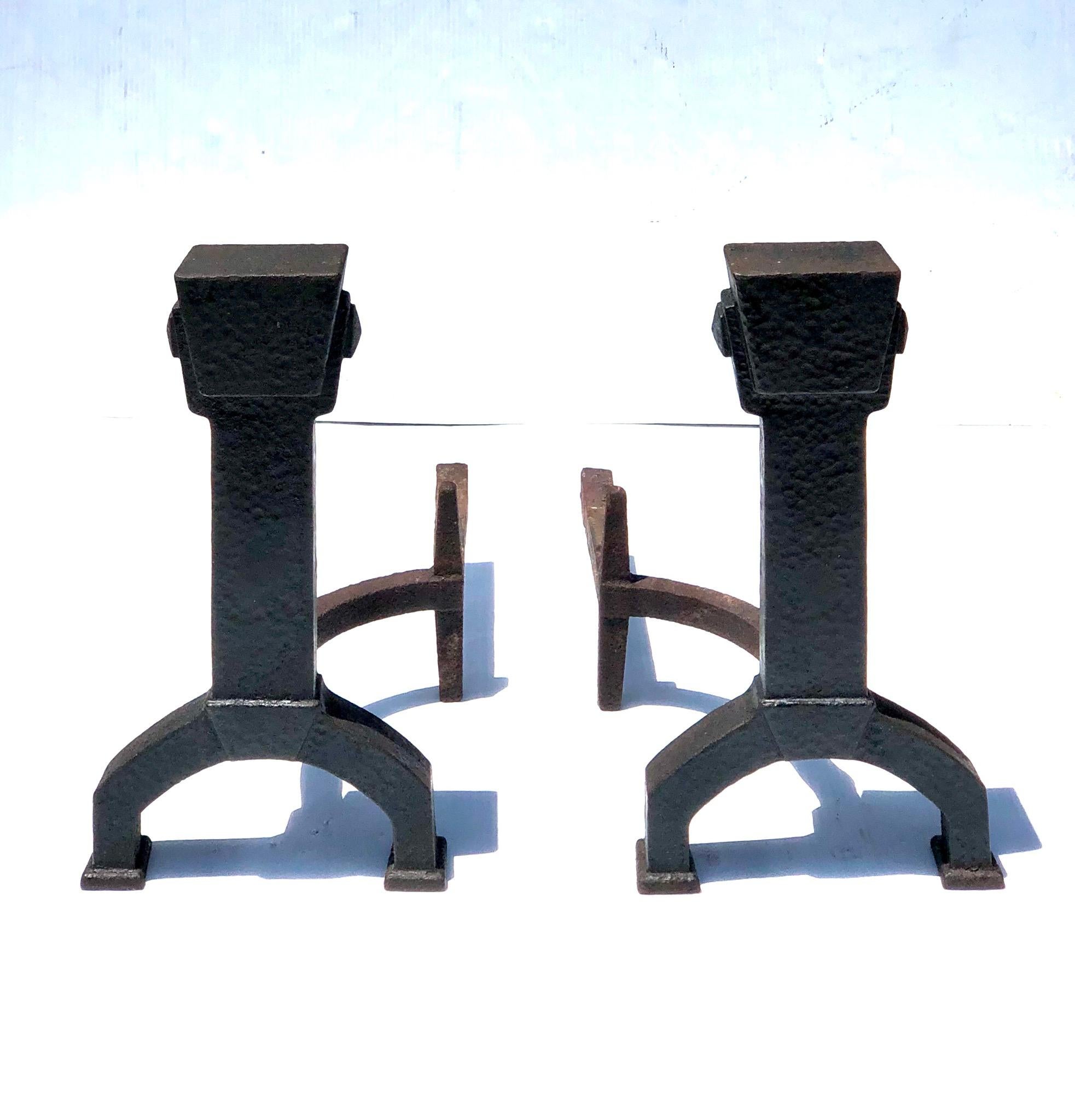 Pair of American Arts & Crafts hammered iron andirons with knockers, circa 1900s.