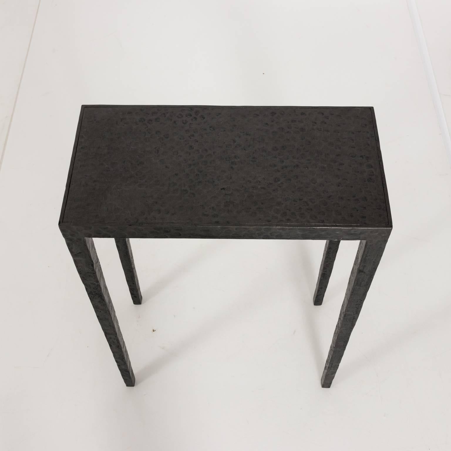 Iron side table by Pierce Martin in a hammered finish, circa 2000.