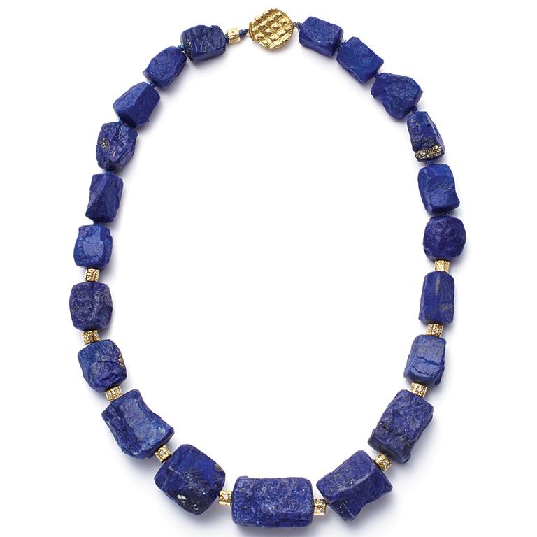 For centuries Lapis Lazuli has long been treasured, for centuries, for its rich, full color. These hammered stones, from Afghanistan, are accompanied by 18 Karat Gold textured beads and clasp. 

Graduated Lapis Lazuli stones range from 10.38mm to