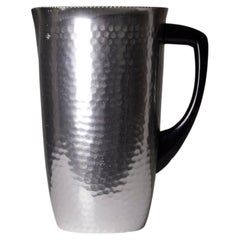Used Hammered metal pitcher