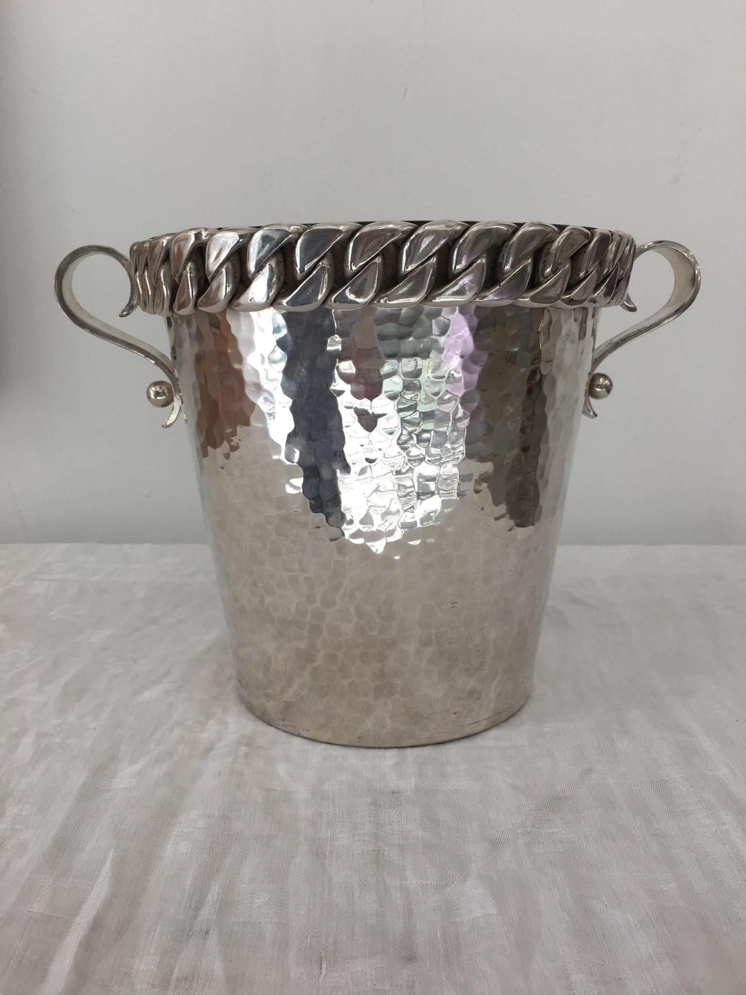 Midcentury Refined design signed underneath Jean Despres 1950 for this wine bottle Bucket in hammered silver plated bronze .
A great chain design around the top, classically used by this artist in his creation.
  On the bottom is  written “à la
