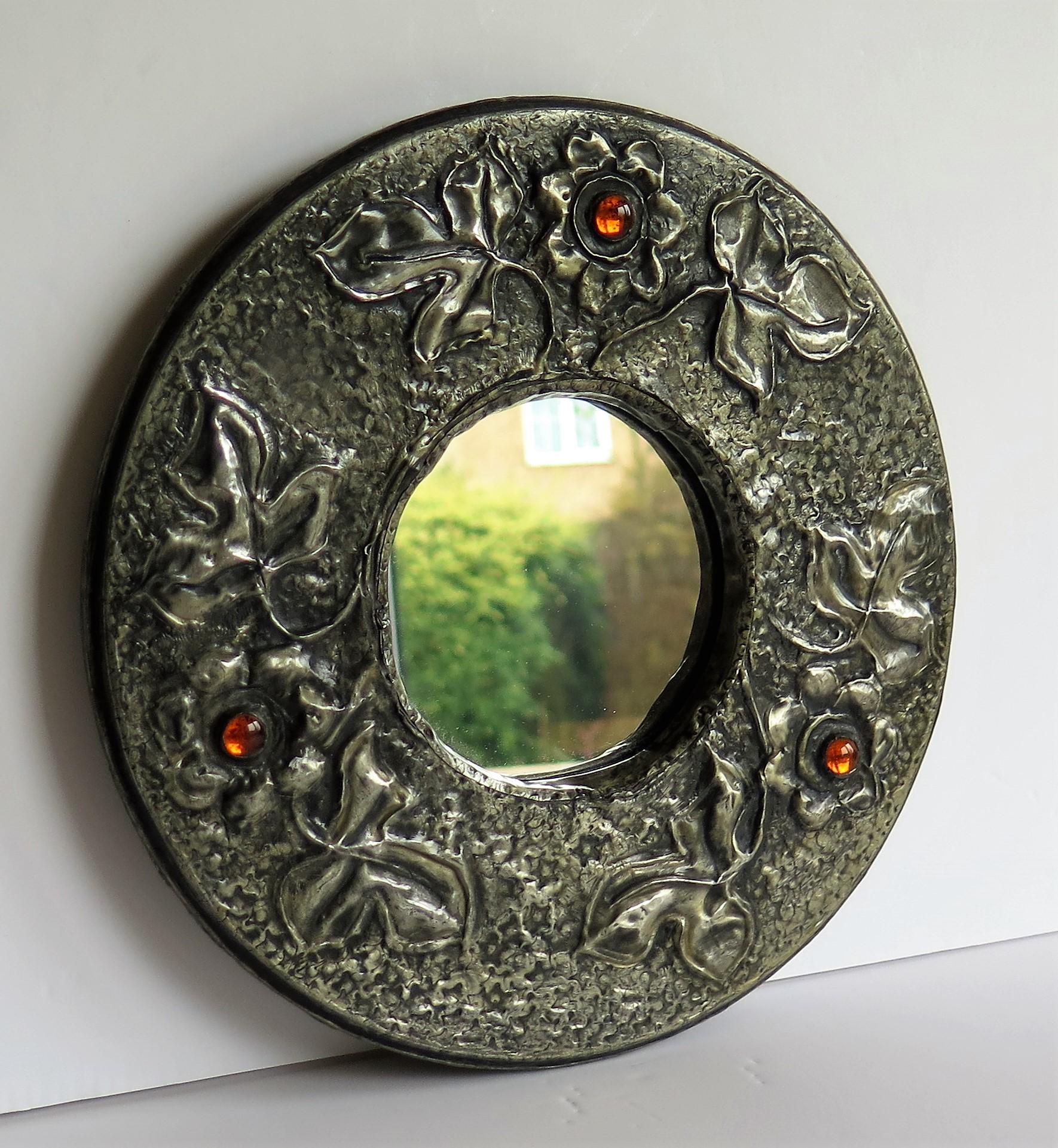 Hammered Pewter round Wall Mirror Arts and Crafts with Amber Cabochons, circa 1900