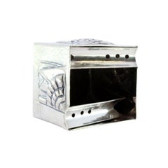 Hammered silver ashtray with cube-shaped reliefs and two cigarette holders