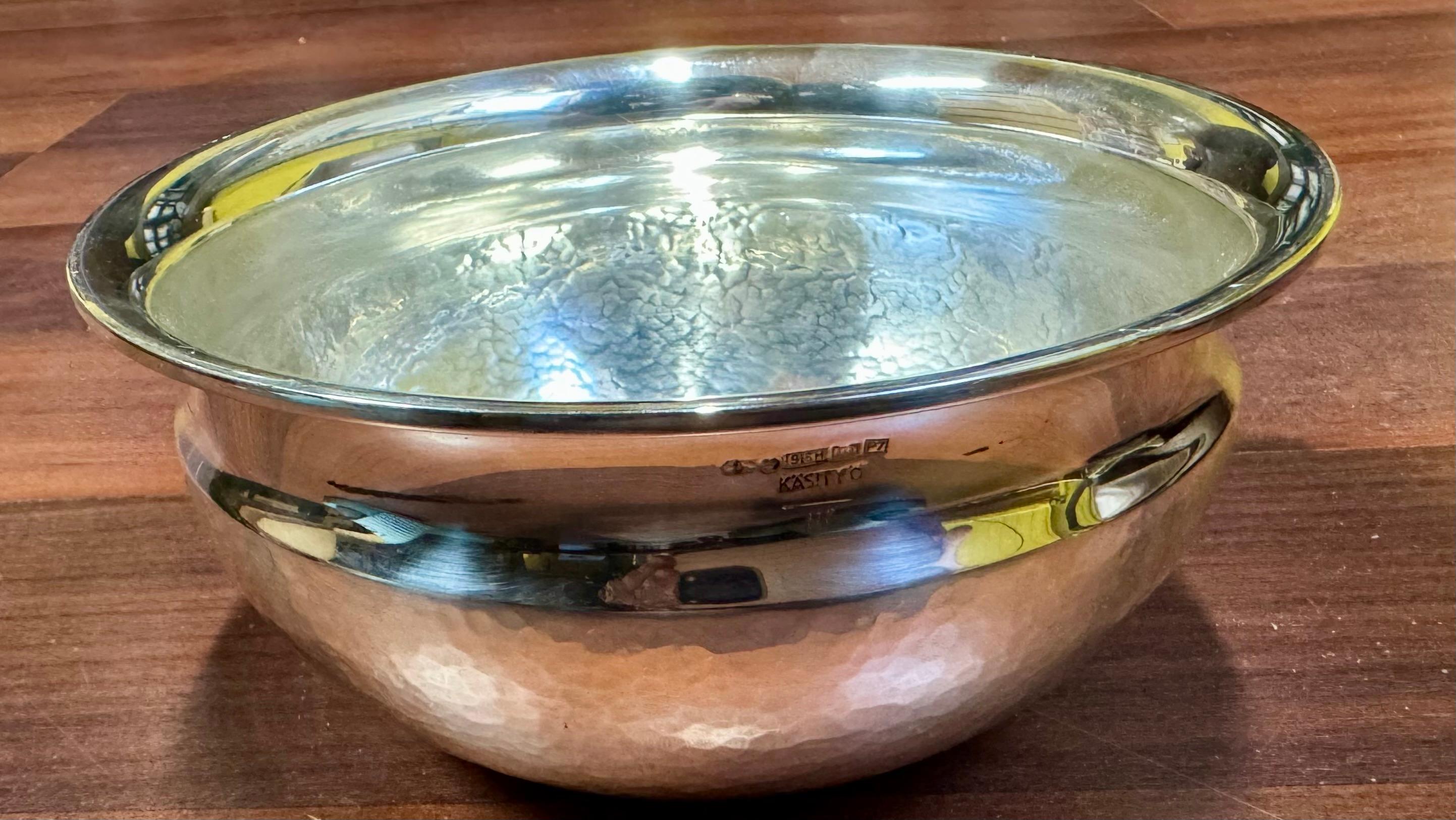 Rare and beautiful handmade, hammered .916H Silver bowl by Tapio Wirkkala.
This was made to order. Not in serial production.
Diameter 15 cm, height 7 cm.
By Kultakeskus Hämeenlinna Finland
Weight: 363g
Marked KÄSITYÖ (handmade) and with designer's