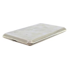 Hammered silver cigarette case with gold interior and beveled corners