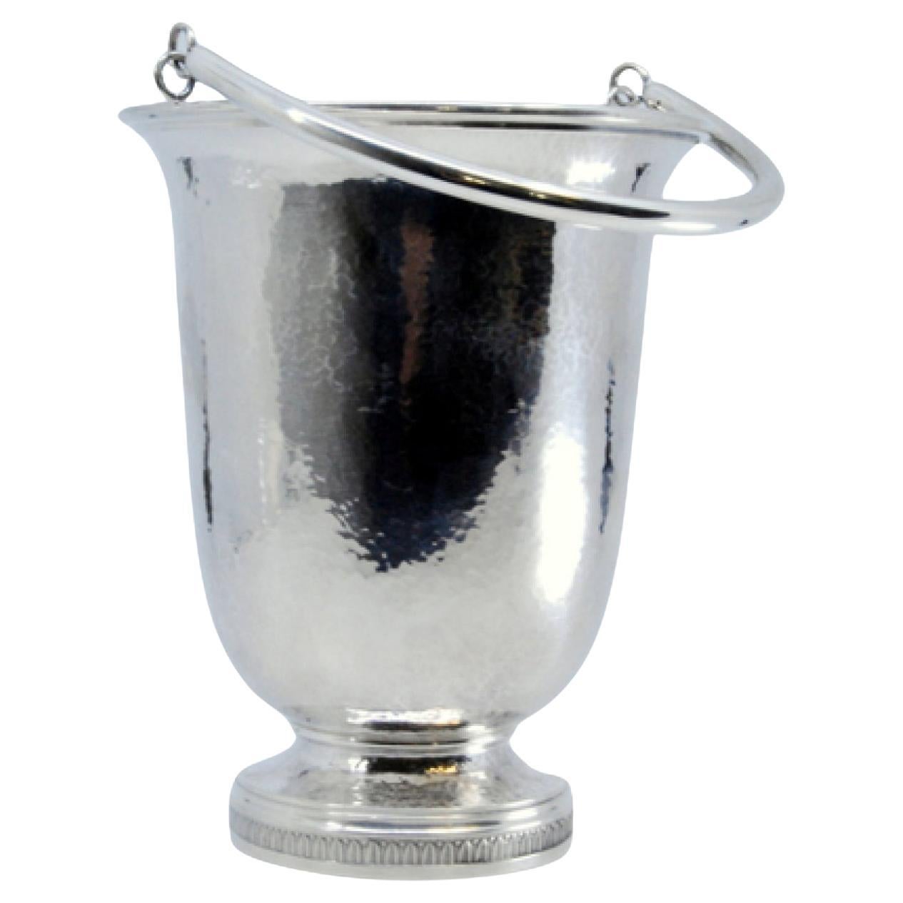 Hammered silver ice bucket with base trim and movable handle