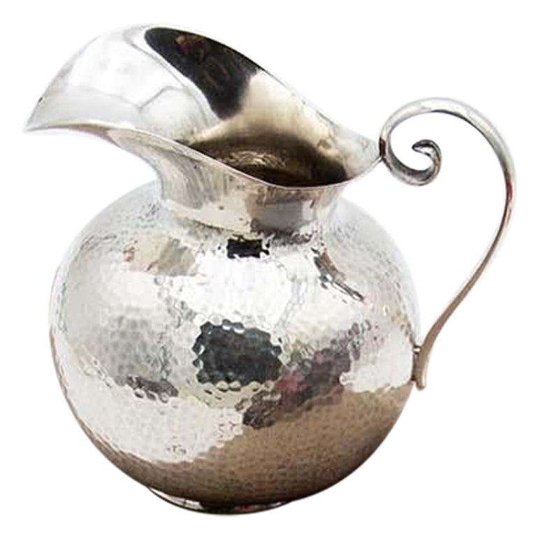 Hammered silver jug