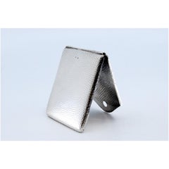 Hammered silver matchbook in the shape of an envelope with a hinged lid
