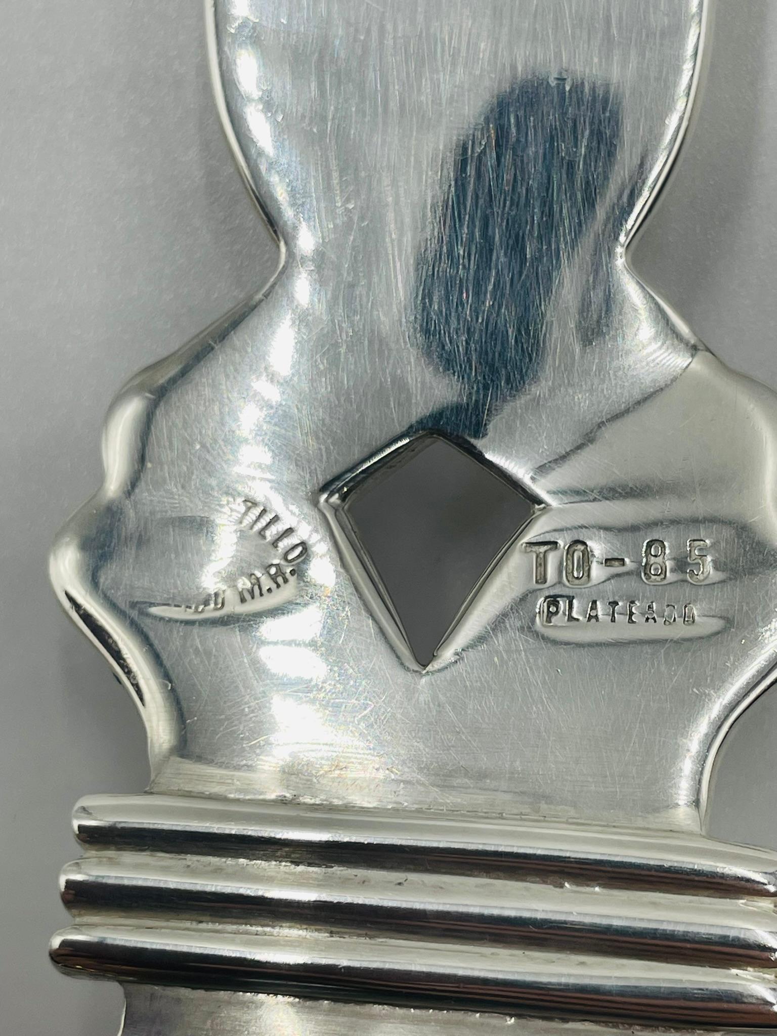 Servierbesteck aus gehämmertem Silber mit skulpturalen, gerollten Griffen im Angebot 7