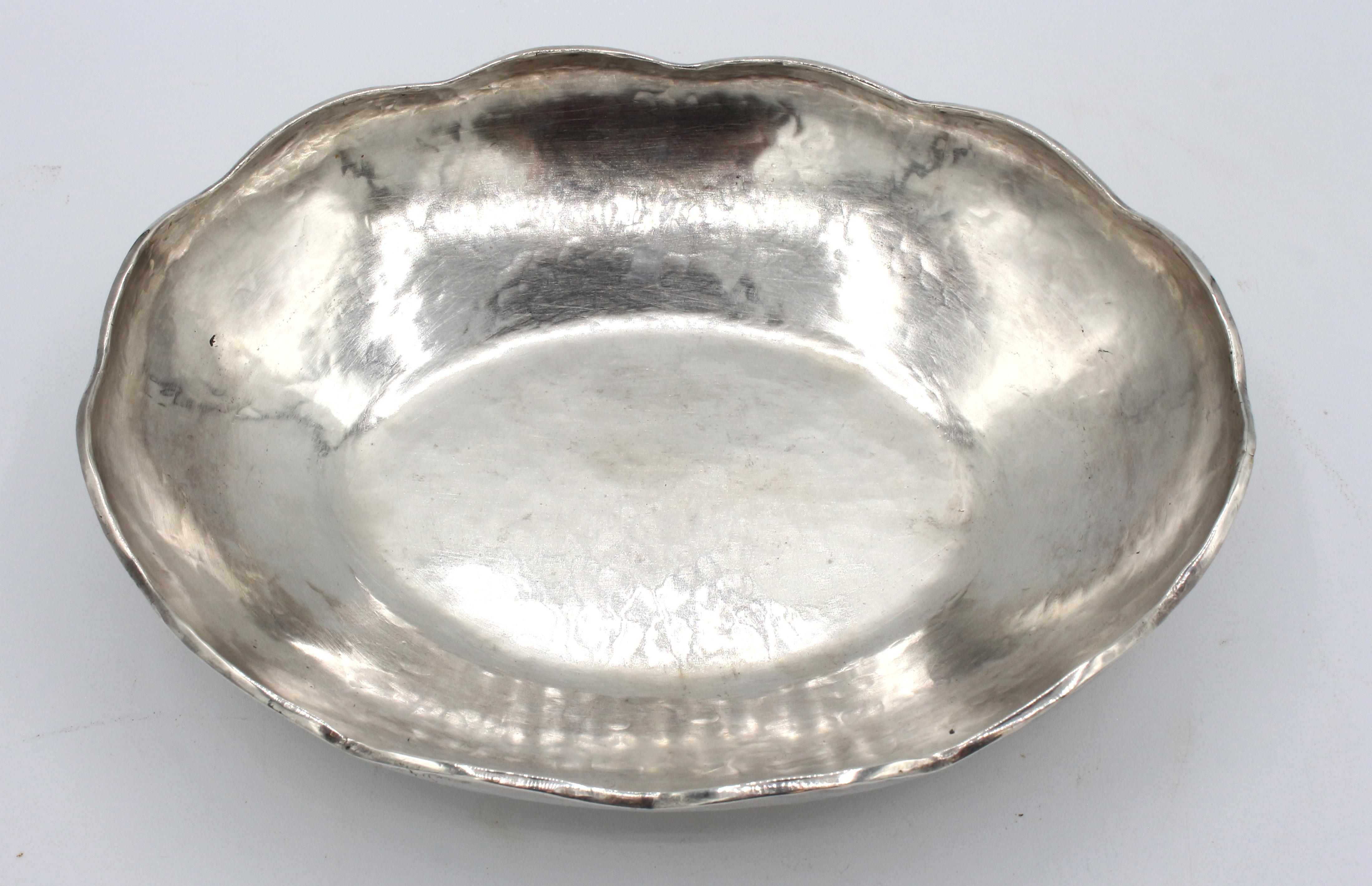 Hammered sterling silver oval lobed bowl, Peru, Welsch Amano silversmiths, c.1960-70s. Fully hallmarked. 19.05 troy oz.
9 3/8