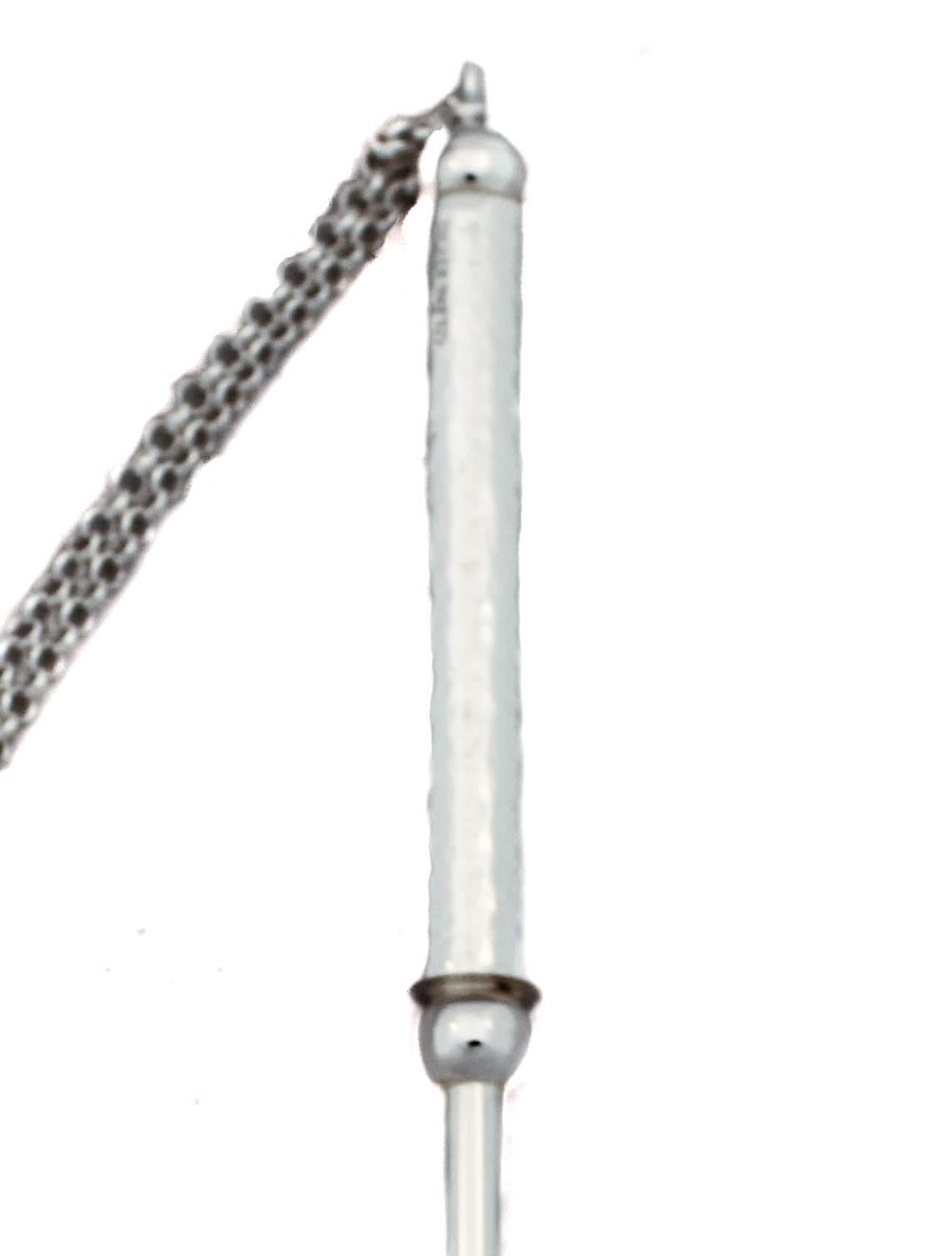 This sterling silver Torah pointer (Yad) from Israel has a hammered finish on the handle and a sterling silver chain on the end to hang on the Torah.  The tip has an index finger pointing, making it easier for the reader to follow along.  A