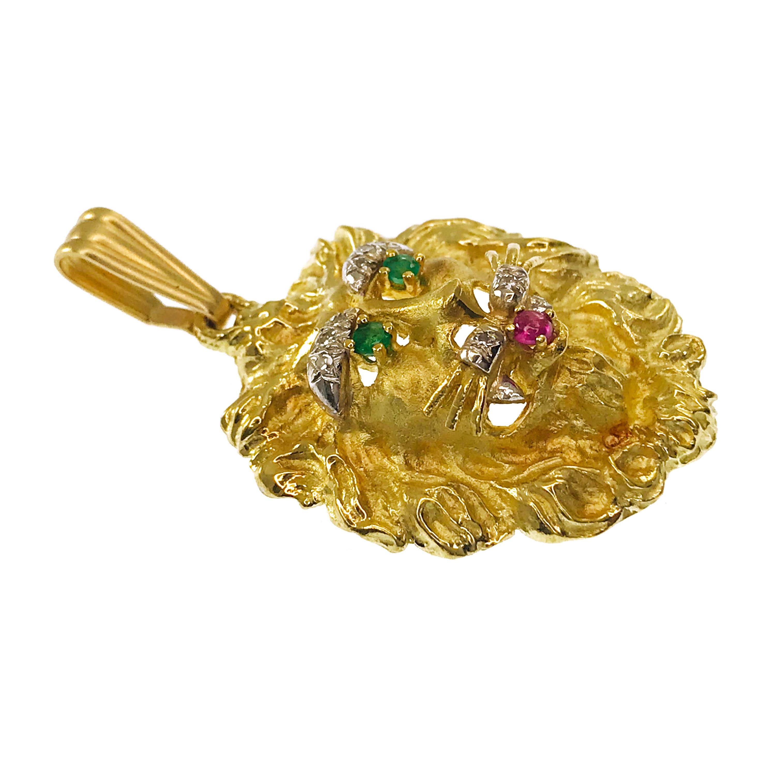 gold lion pendant with ruby eyes