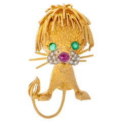 Spilla Leone Hammerman Brothers 18K con gemme incastonate