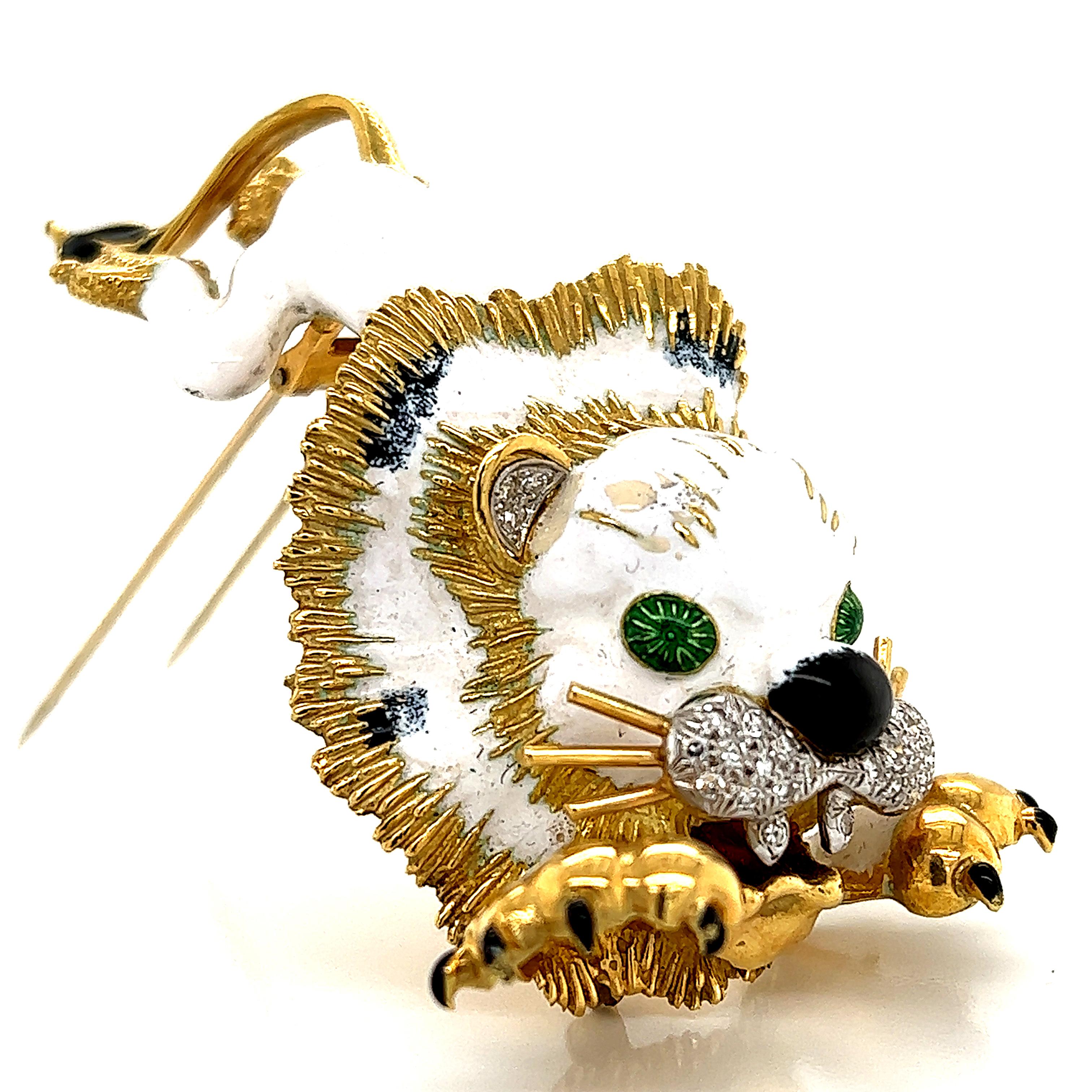 Gorgeous creation from famed American designers the Hammerman brothers. The item for your consideration today is a 18k yellow gold brooch crafted in the theme of an lion. The lion shows details throughout as it is fully enameled with white, green