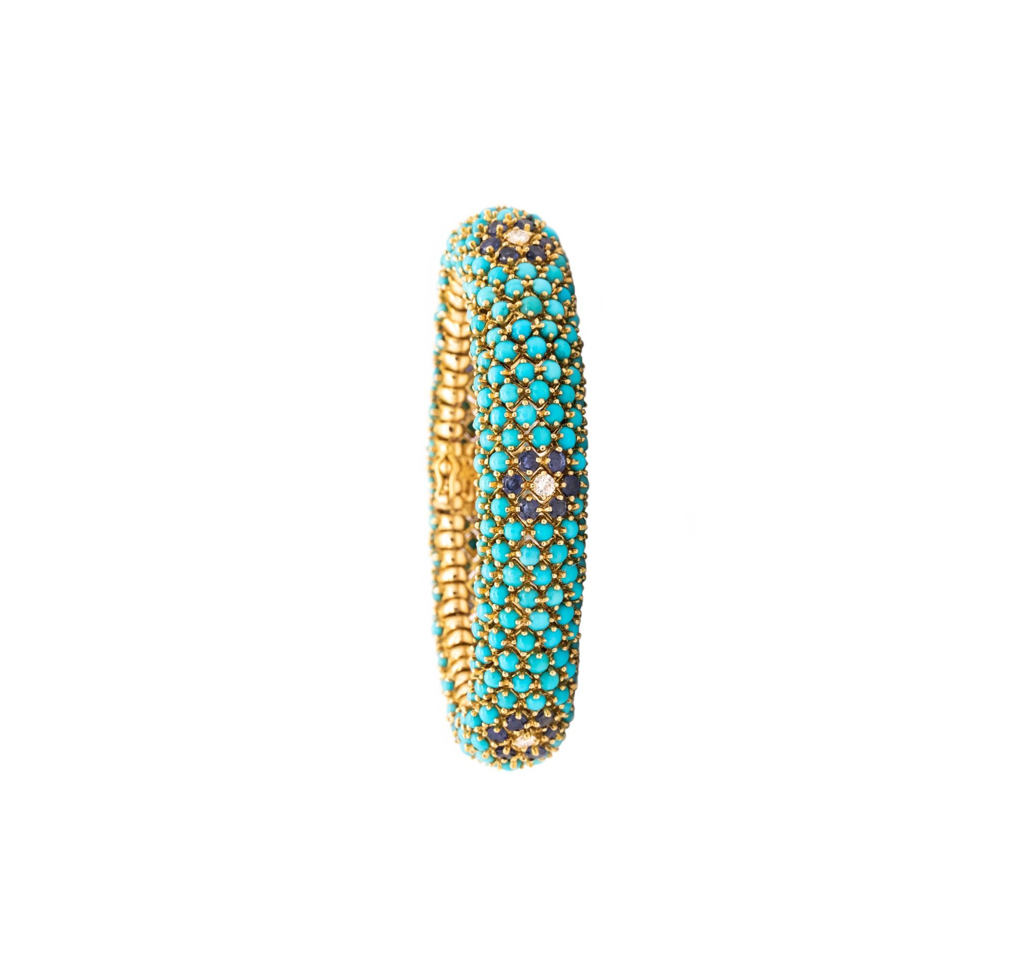 A gemstones bracelet designed by the Hammerman Brothers.

A flexible bracelet from the mid-century period, circa 1960's. It was carefully crafted in solid 18 karats yellow gold and suited with a push boxed lock, with a hinged figure 8 for extra