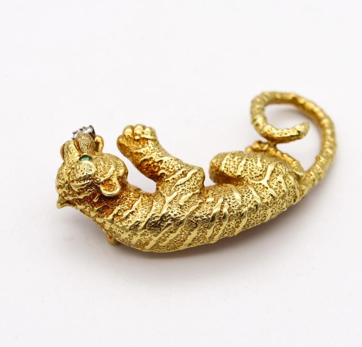 A tiger brooch Designed by Hammerman Brothers.

Stunning piece, created by the American jewelry designers of Hammerman Brothers during the late mid-century period, back in the 1970's. This tiger brooch has been crafted in solid yellow gold of 18