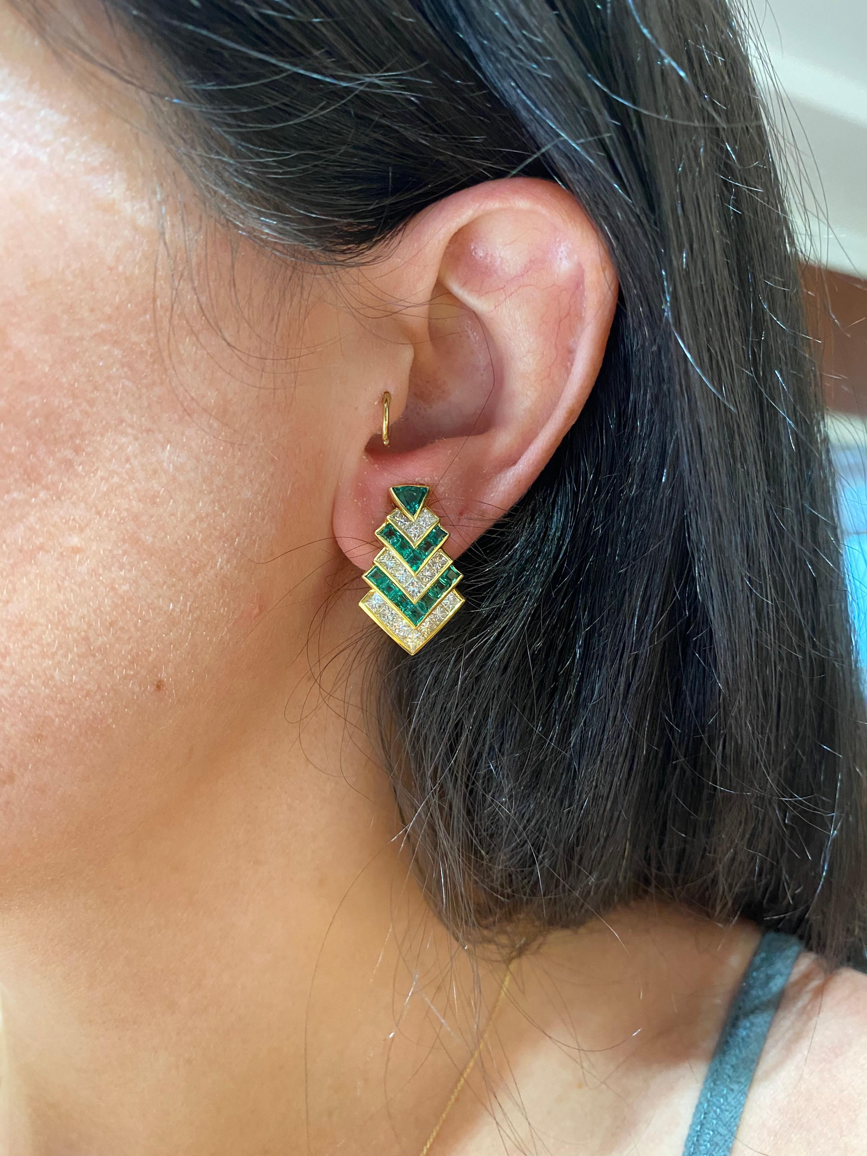 Chevron designed diamonds and emeralds for a refined but edgy look. Hammerman Brothers 18 karat yellow gold emerald and diamond earrings with square-cut emeralds and diamonds with a trilliant cut emerald top. 30 princess cut diamonds, totaling 3.57