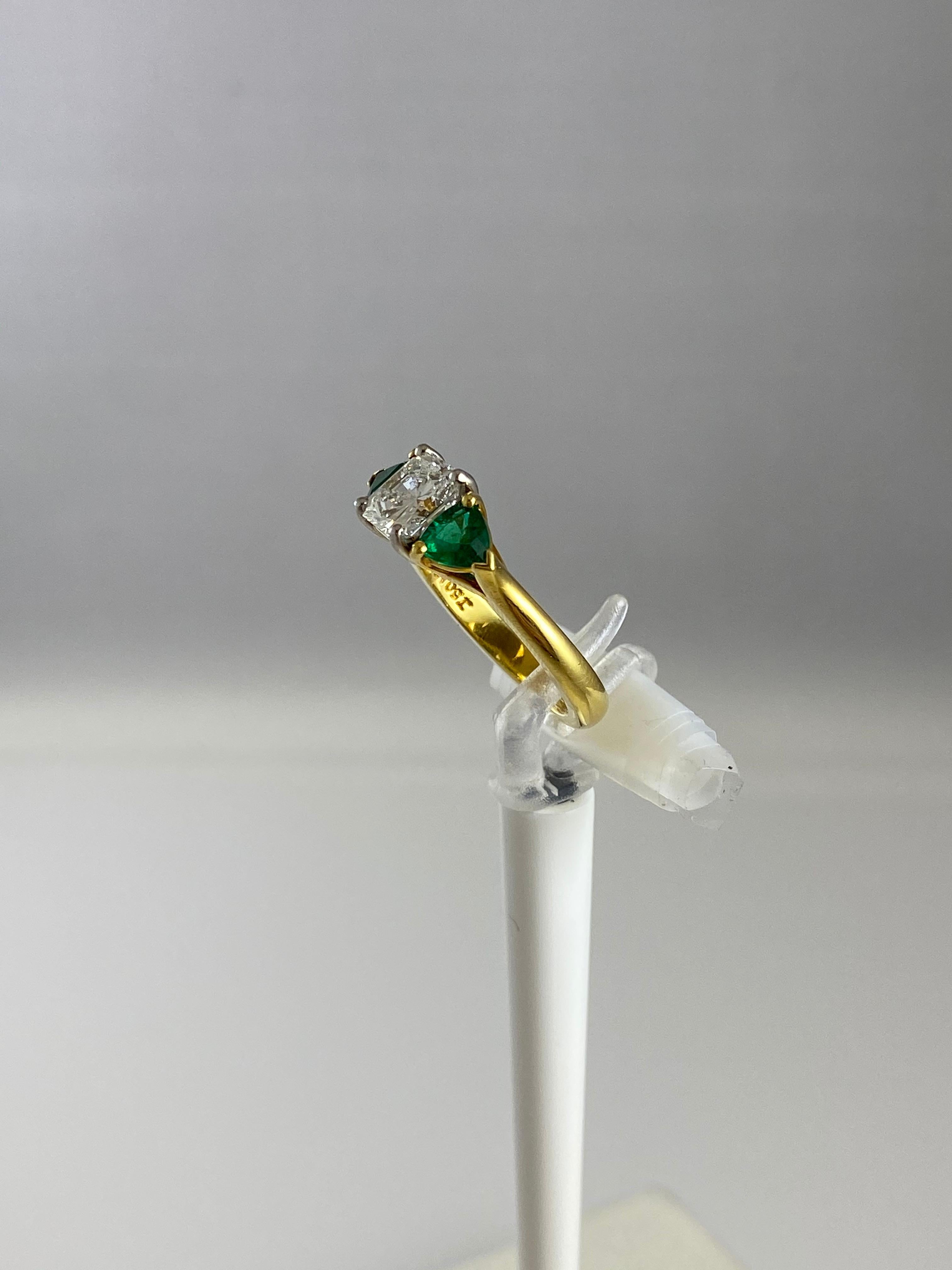 Hammerman Jewels 18k Yellow Gold & Platinum Diamond and Emerald Ring. 1.12 carat radiant diamond, and 0.67 carats of emeralds. Size 5 3/4.