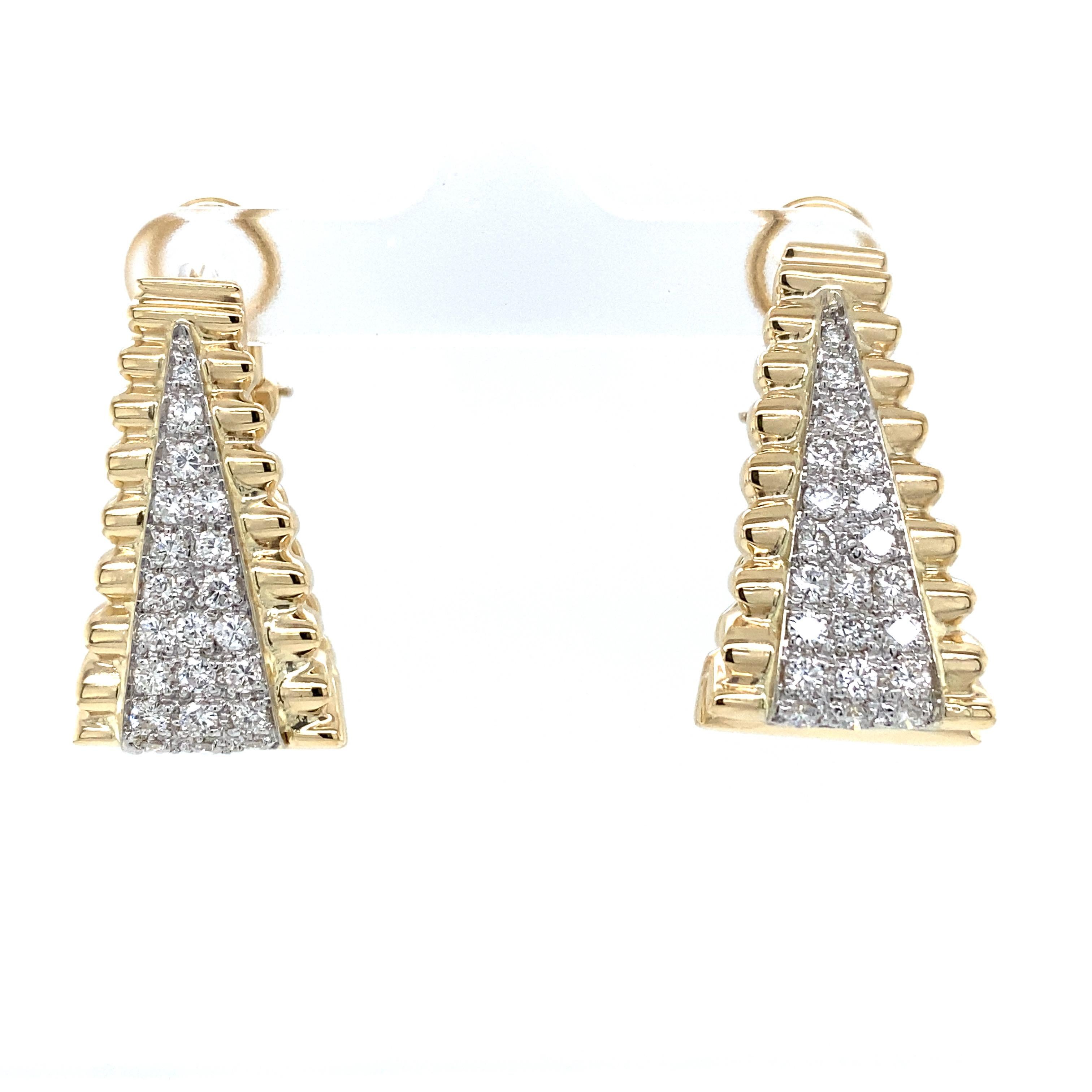 Hammerman Brothers Diamond Elongated Hoop Earring in 14K Two-Tone Gold.  (54) Round Brilliant Cut Diamonds weighing 1.30 carat total weight, G-I in color and VS-SI in clarity are expertly set.  The Earrings measures 1 1/8 inch in length and 1/2 inch