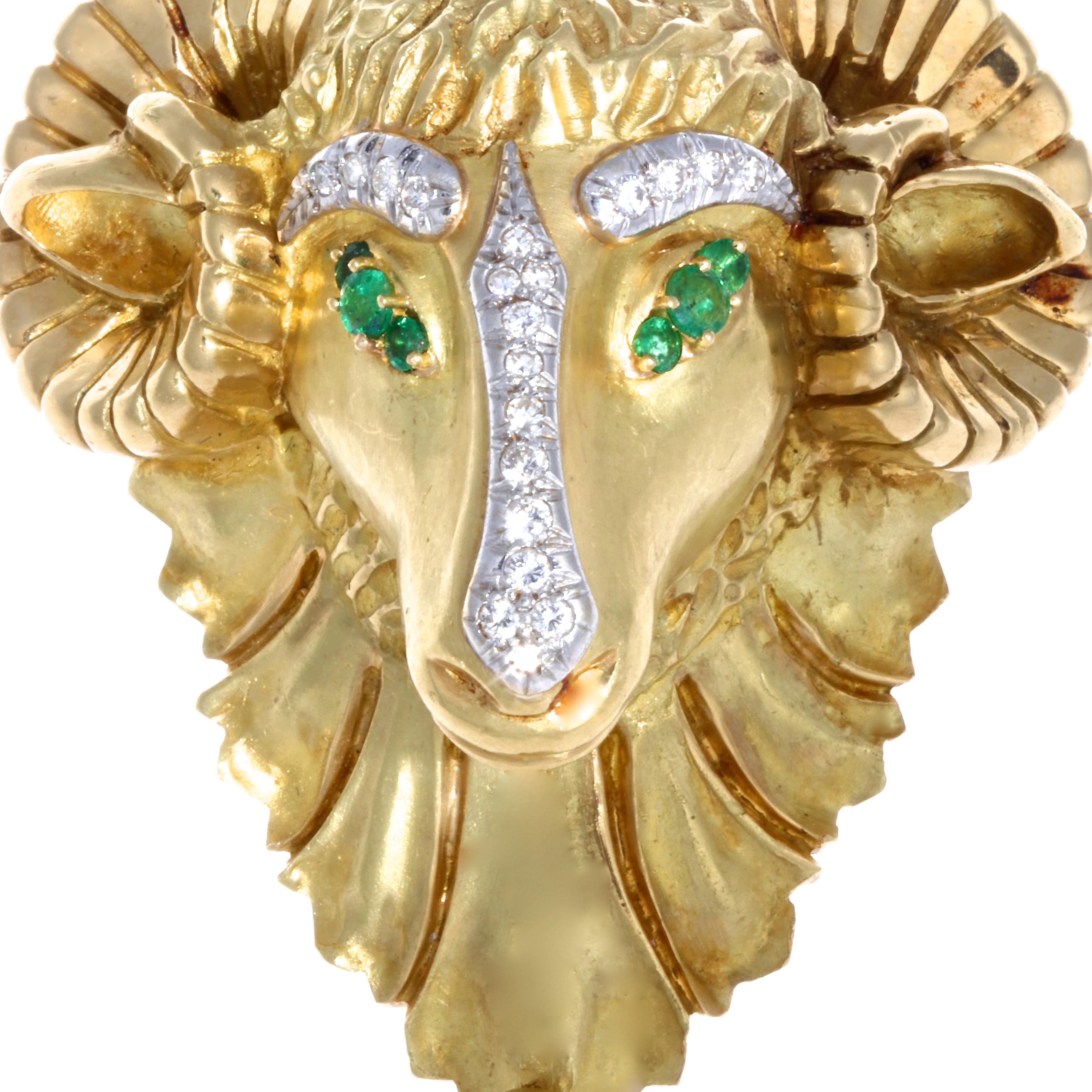 Bold and gold is all we have to say. Truly a statement piece, a conversation starter and fun to wear. The Hammerman Brothers ram pendant features 20 single cut diamonds approximately 0.85 carats, G average VS clarity. With 6 emeralds approximately