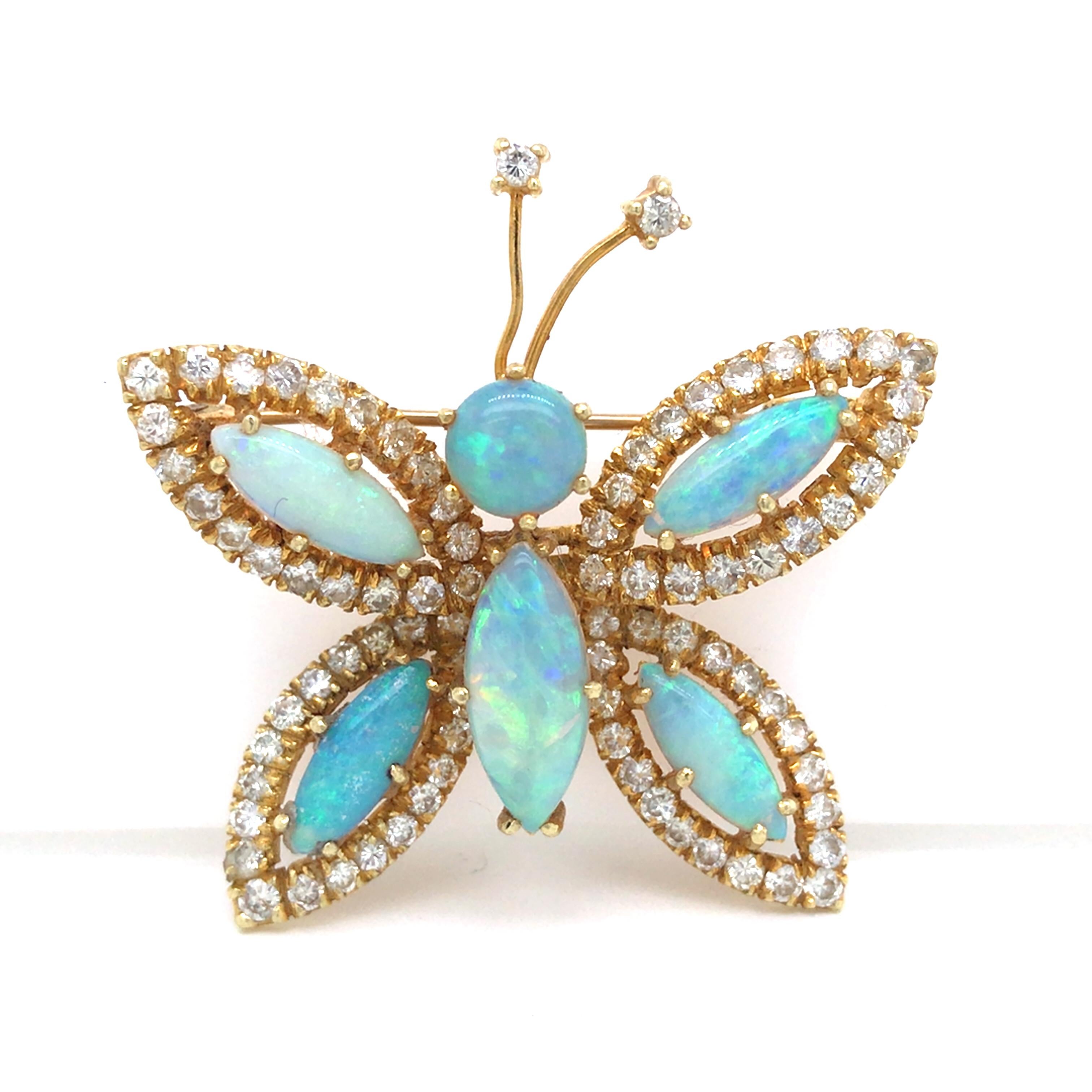 Hammerman Brothers Diamond Opal Butterfly Pin in 18K Yellow Gold.  Round Brilliant Cut Diamonds weighing 2.40 carat total weight, G-H in color and VS-SI in clarity are expertly set.  The Butterfly measures 1 1/2 inch in length and 1 5/8 inch in