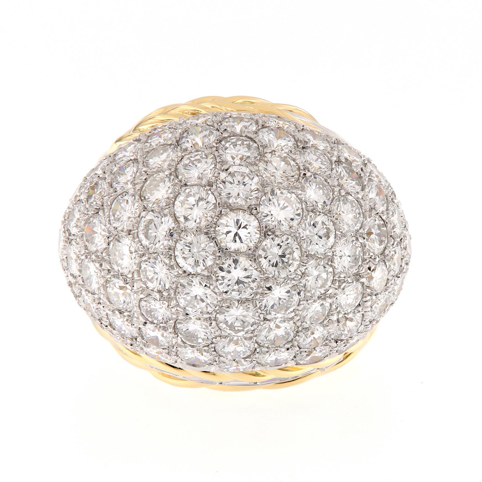 This epic estate ring is as fun as it is important. This beautifully crafted ring from Hammer Brothers of New York is truly a striking piece of jewelry. Showcasing almost eight carats of diamonds and rope design detail. The ring is crafted of