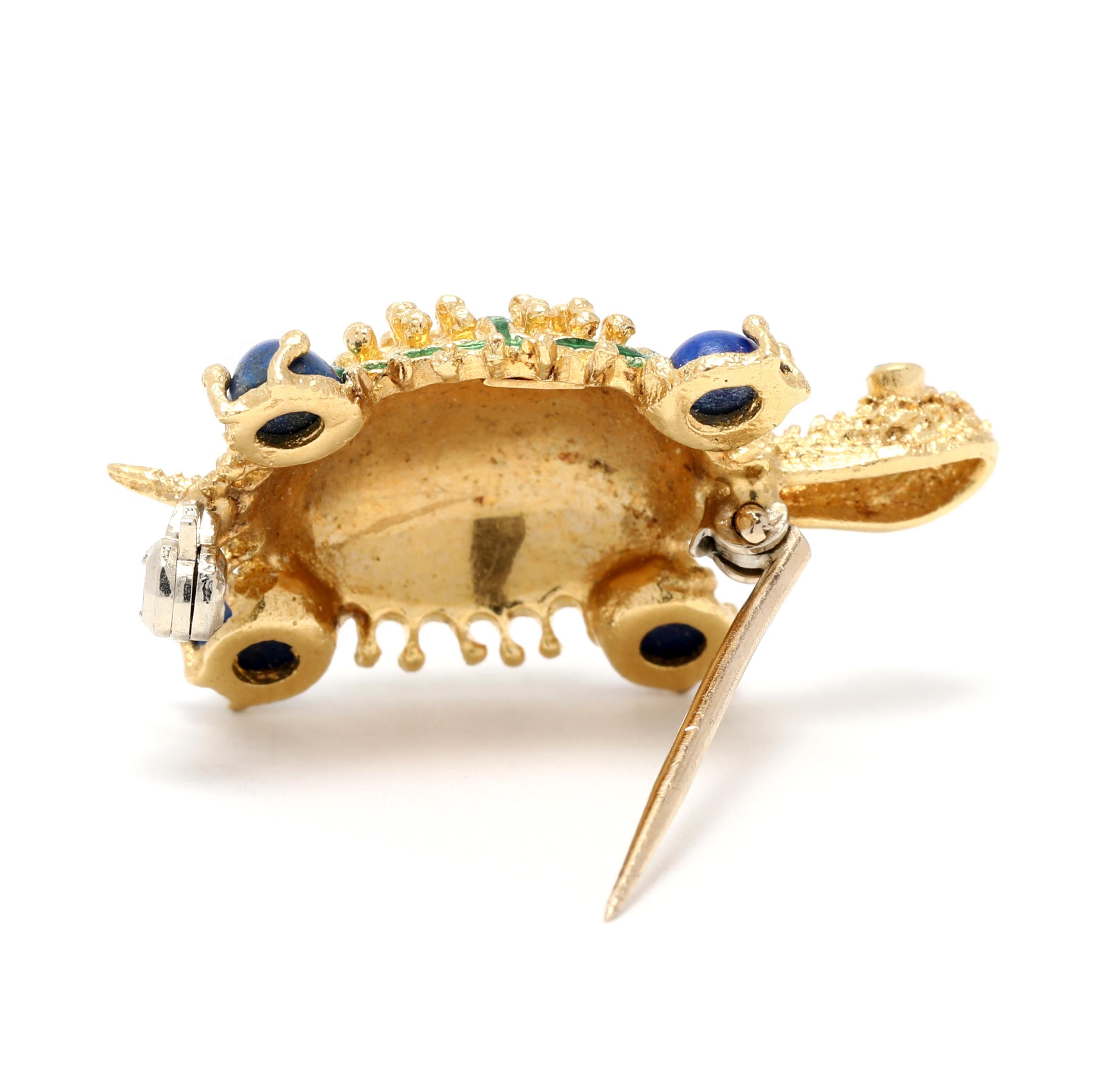 This exquisite 18K Yellow Gold Lapis Turtle Brooch created by Hammerman Brothers is the perfect accessory for any special occasion. Crafted with a bold, bright emerald lapis stone, this small turtle brooch features a detailed enamel shell and