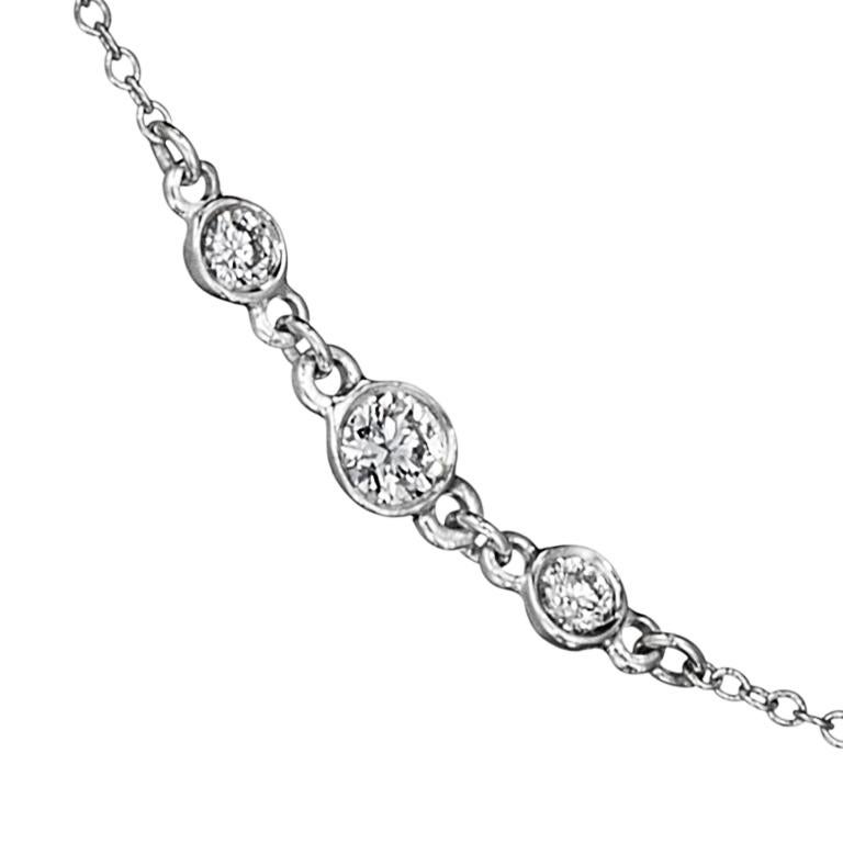 When round diamonds won't do, add our Marquise Diamonds By The Yard Necklace to your collection. 

Composition: 209 round diamonds weighing 6.07 carats and 6 marquise diamonds totaling 1.32 carats, set in platinum. 