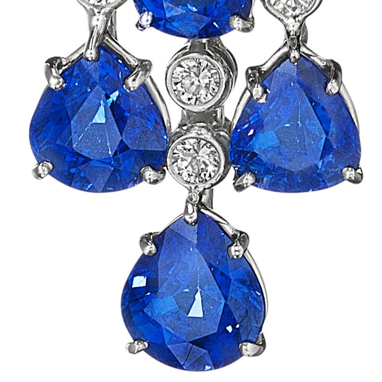 A sapphire and diamond chandelier pendant necklace boasts a beautiful collection of diamonds and azure blue sapphires. 

Composition: 18 sapphires weighing 22.64 carats and 305 diamonds totaling 12.22 carats set in 18 karat white gold.