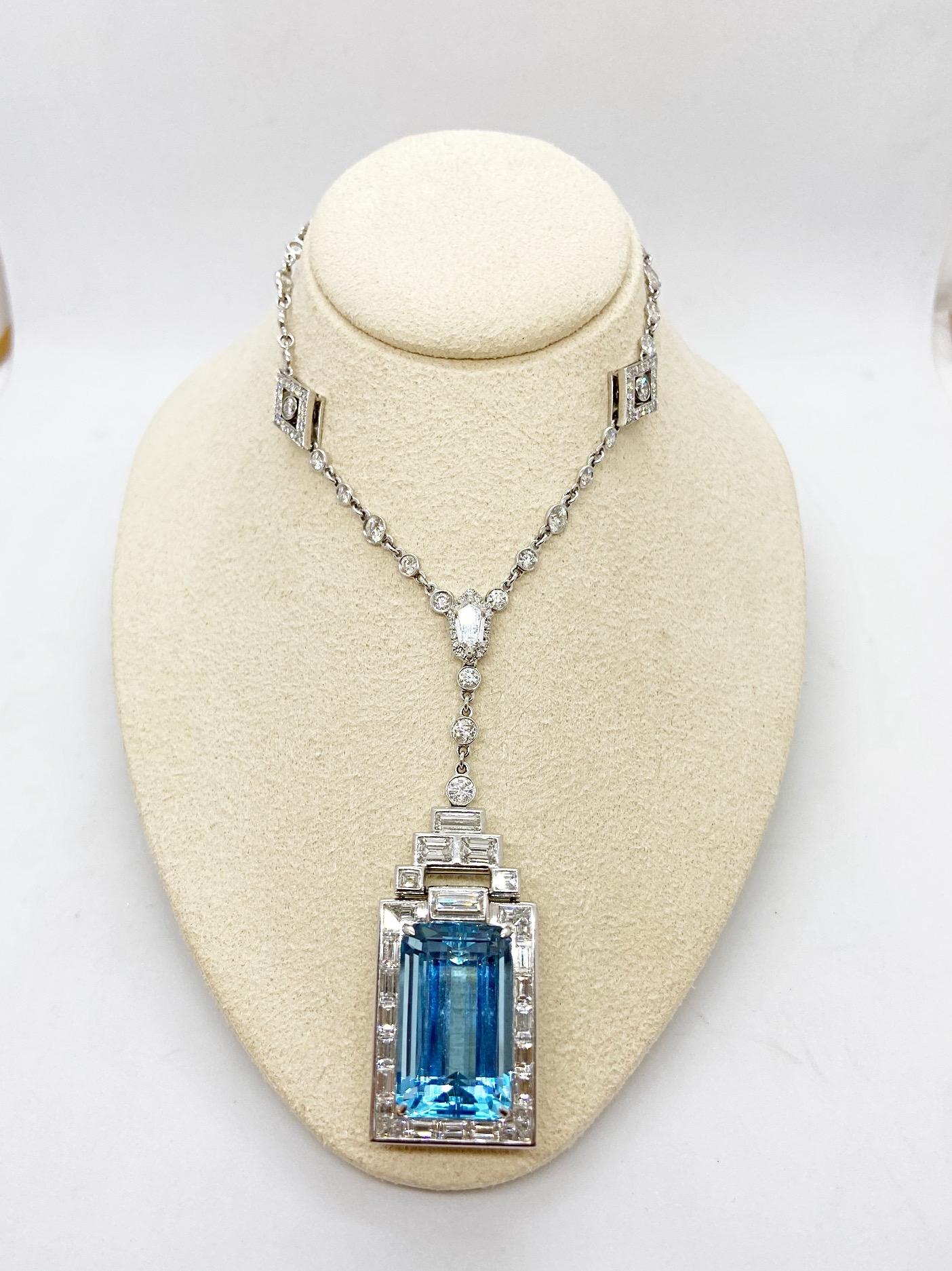 Known best for old world craftsmanship, Hammerman Brothers is a 75 year old company which remains American made.
This magnificent Art Deco-inspired pendant is the perfect example of their extraordinary workmanship. The platinum deco pendant necklace