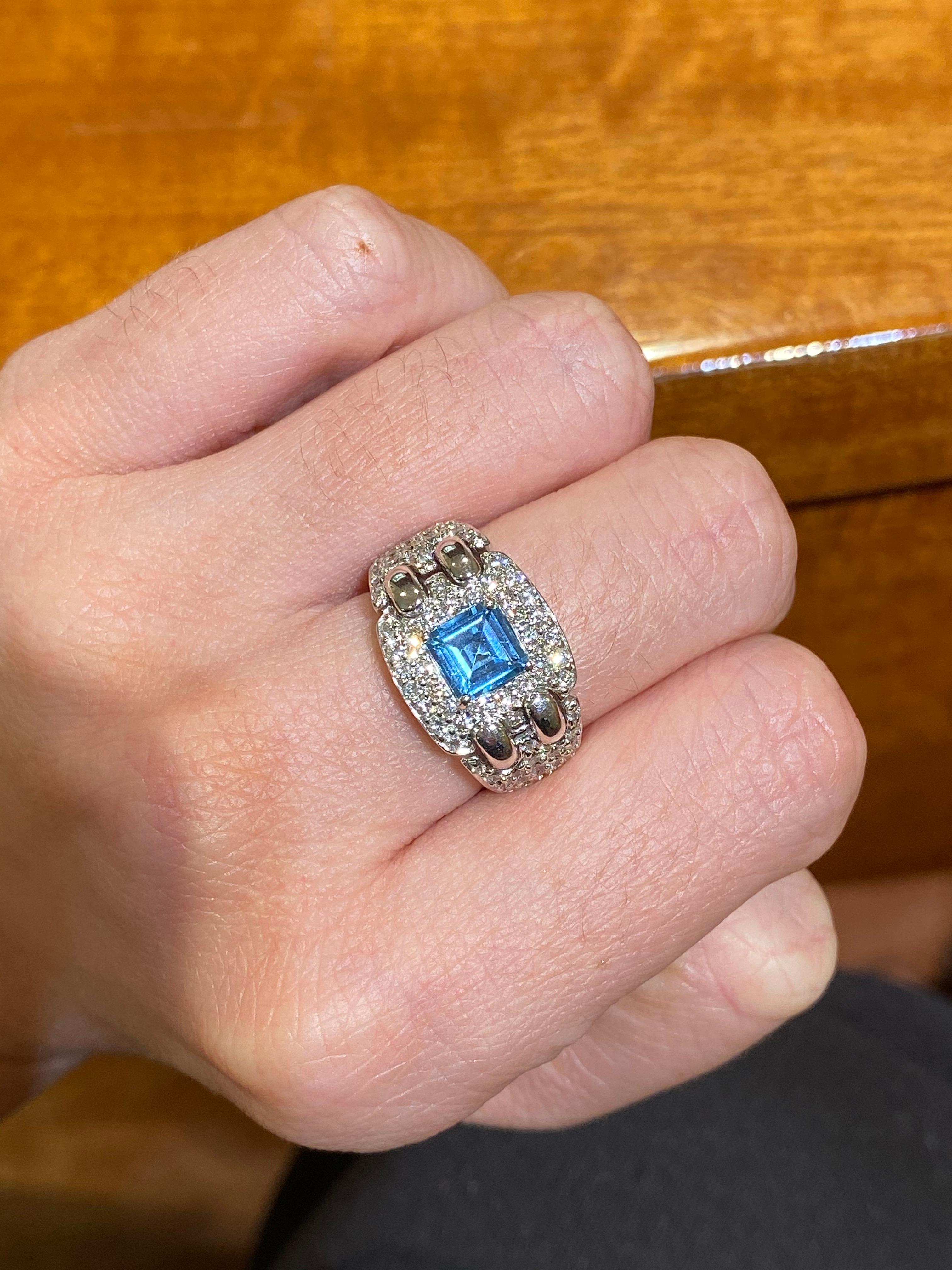 Hammerman Jewels 18 Karat White Gold Diamond and Blue Topaz Ring. 1.29 carats of diamonds, 0.96 carat blue topaz. Size 6.