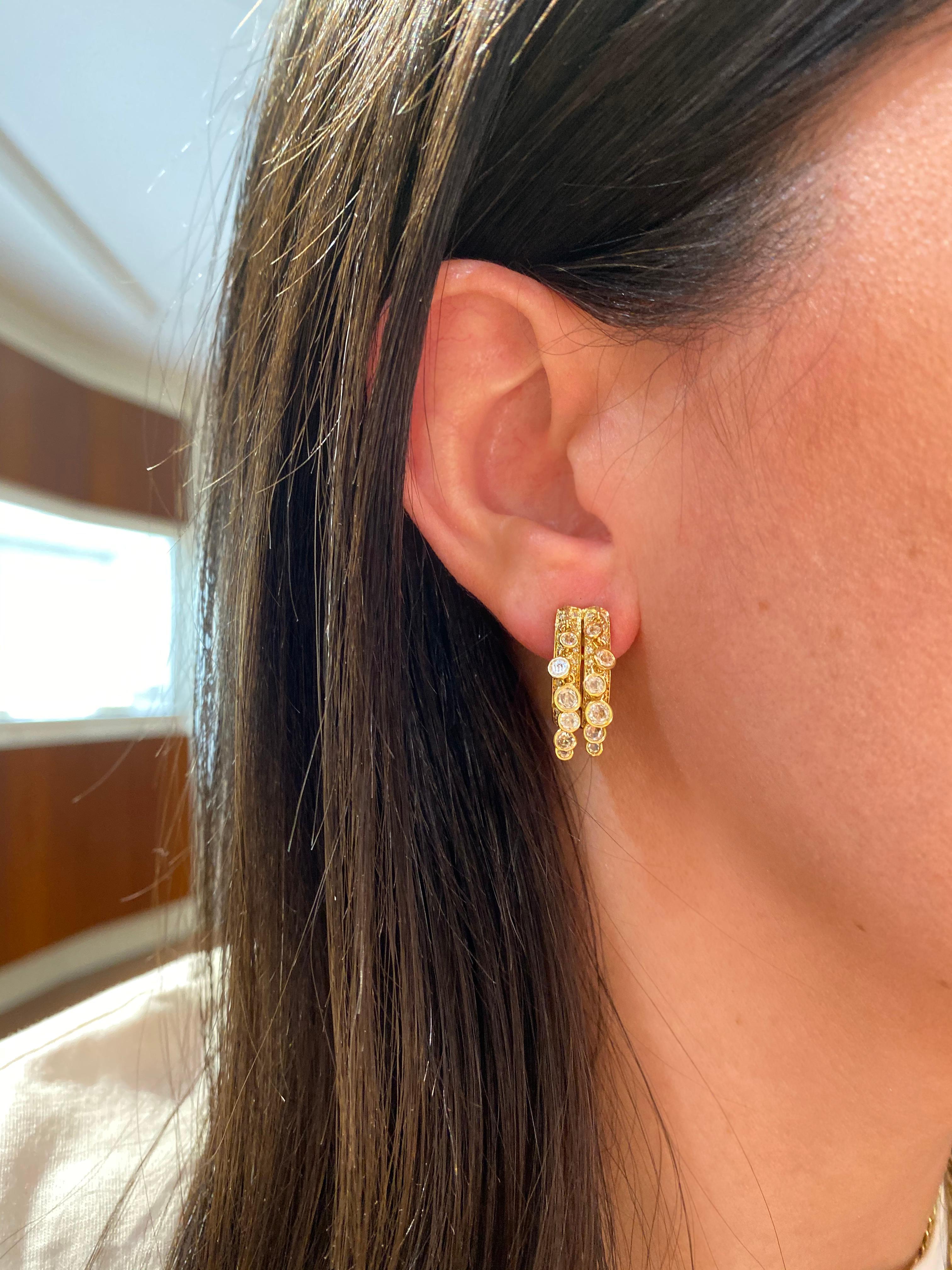 Hammerman Jewels 18 karat yellow gold diamond shaker earrings with pave set diamonds and bezel set diamond shakers. 120 diamonds for 1.67 carats. 