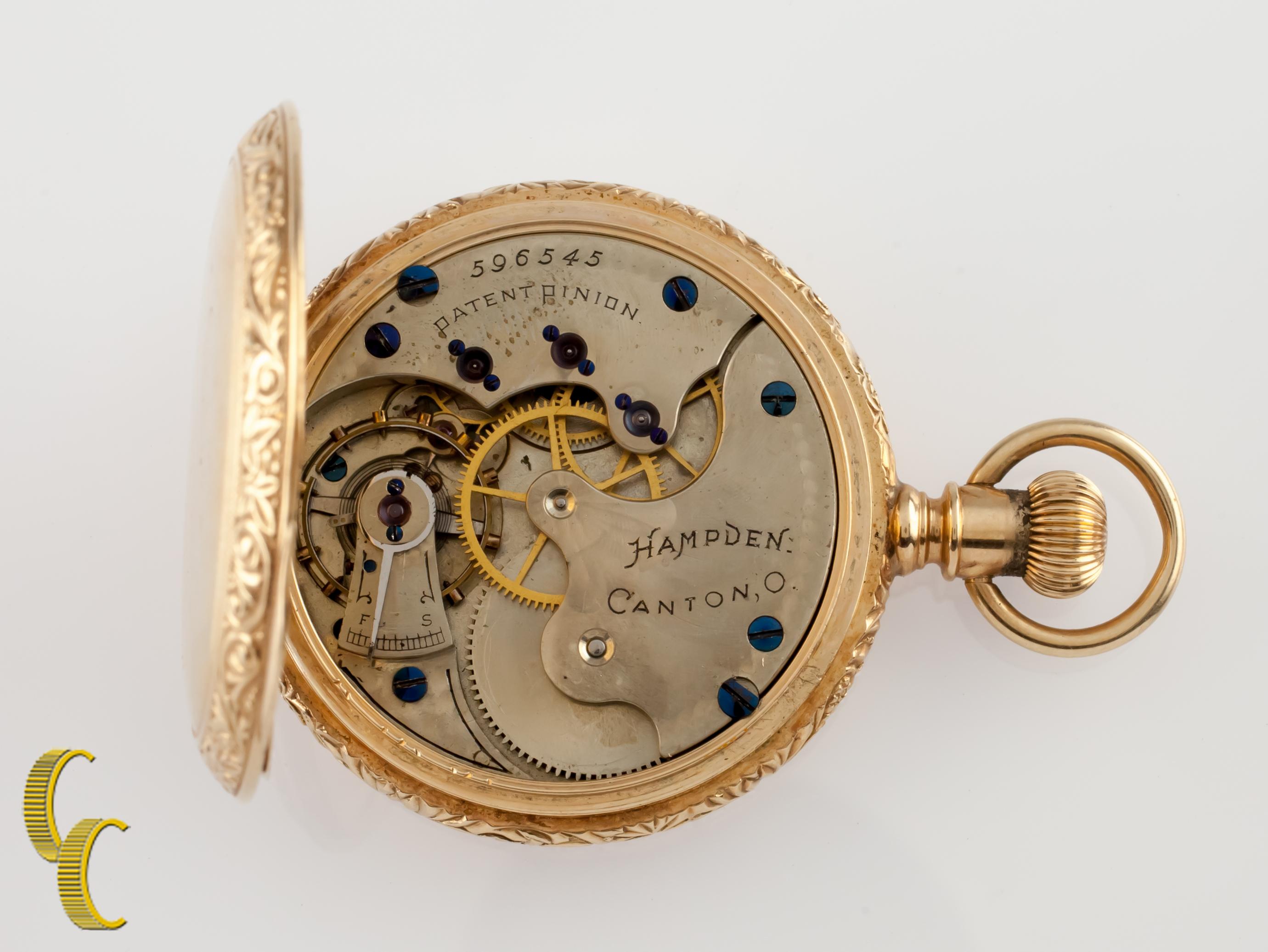 Beautiful Antique Hampden Pocket Watch w/ White Dial Including Cobalt Blue Hands & Dedicated Second Dial
14k Yellow Gold Case w/ Intricate Hand-Etched Repousse Design on Case Edge
Black Roman Numerals
Case Serial #95096
11-Jewel Hampden Movement