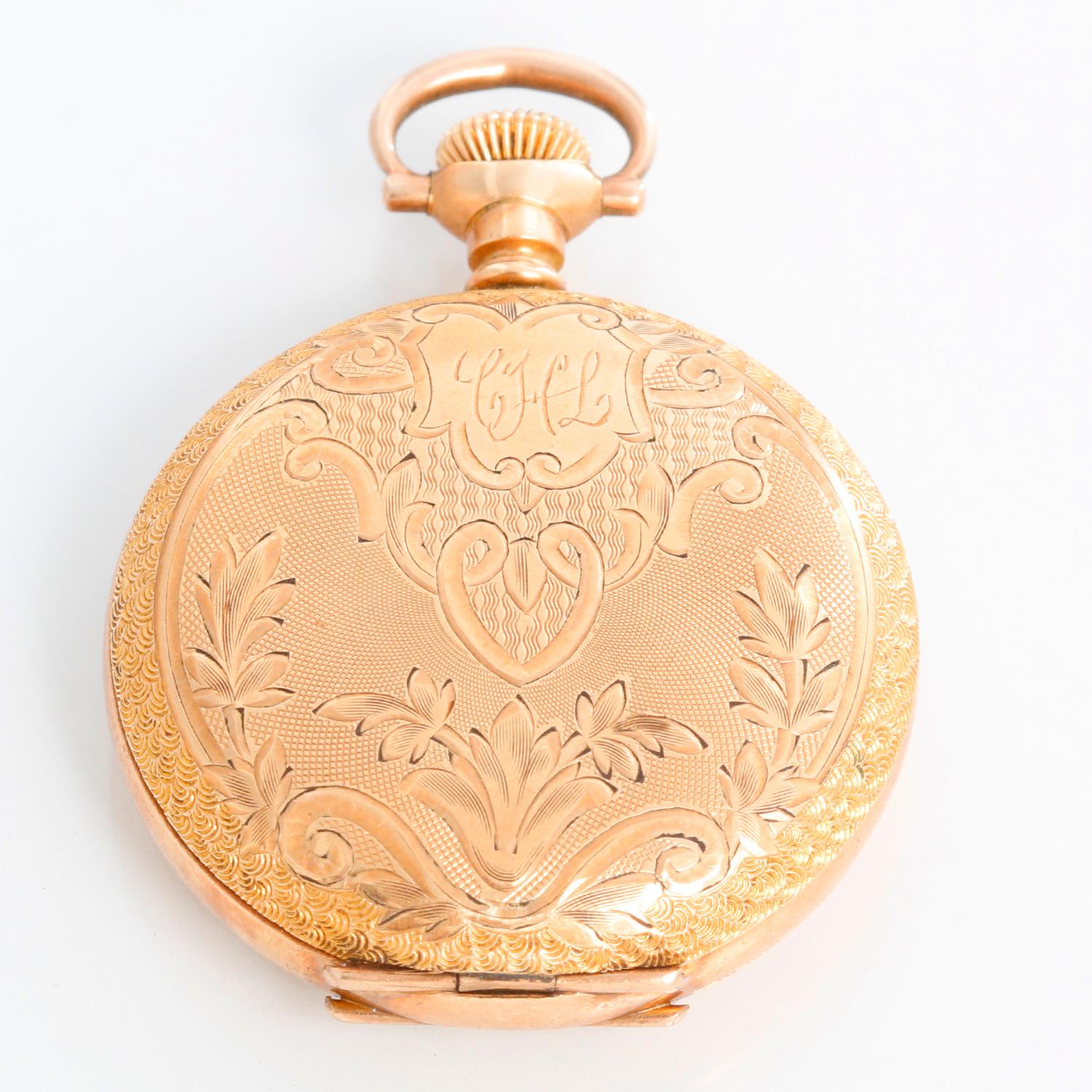 Hampden Gold Filled Ladies Pendant Pocket Watch - Manual winding. Gold filled; ornate engraving ( 33mm ). White dial with Arabic numerals. Pre-owned with custom box.
Will be serviced upon purchase. Delivery time will vary. Circa 1905.