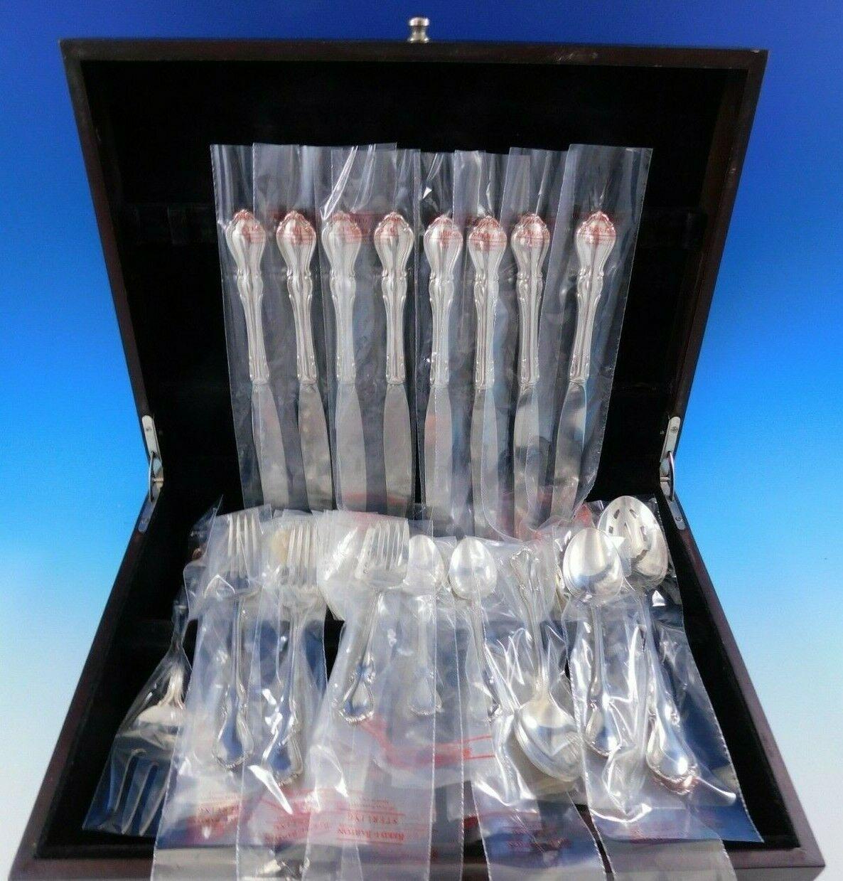 New in factory sleeves, Hampton Court by Reed and Barton sterling silver flatware set - 44 pieces. This set includes:

8 knives, 9 1/8