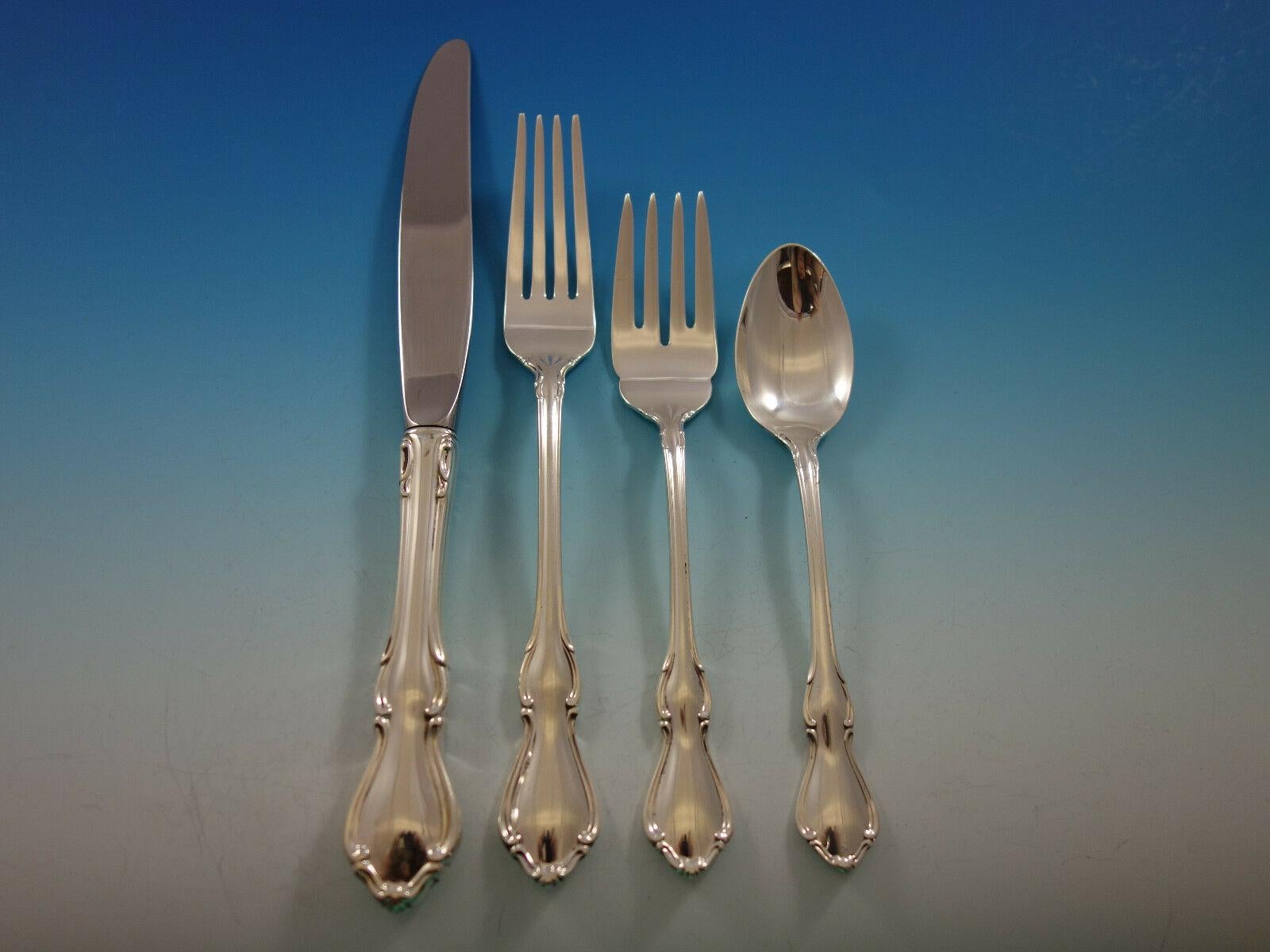 Large Hampton Court by Reed and Barton sterling silver flatware set - 118 pieces. This service for 18 is perfect for large gatherings. This set includes:

18 knives, 9 1/8