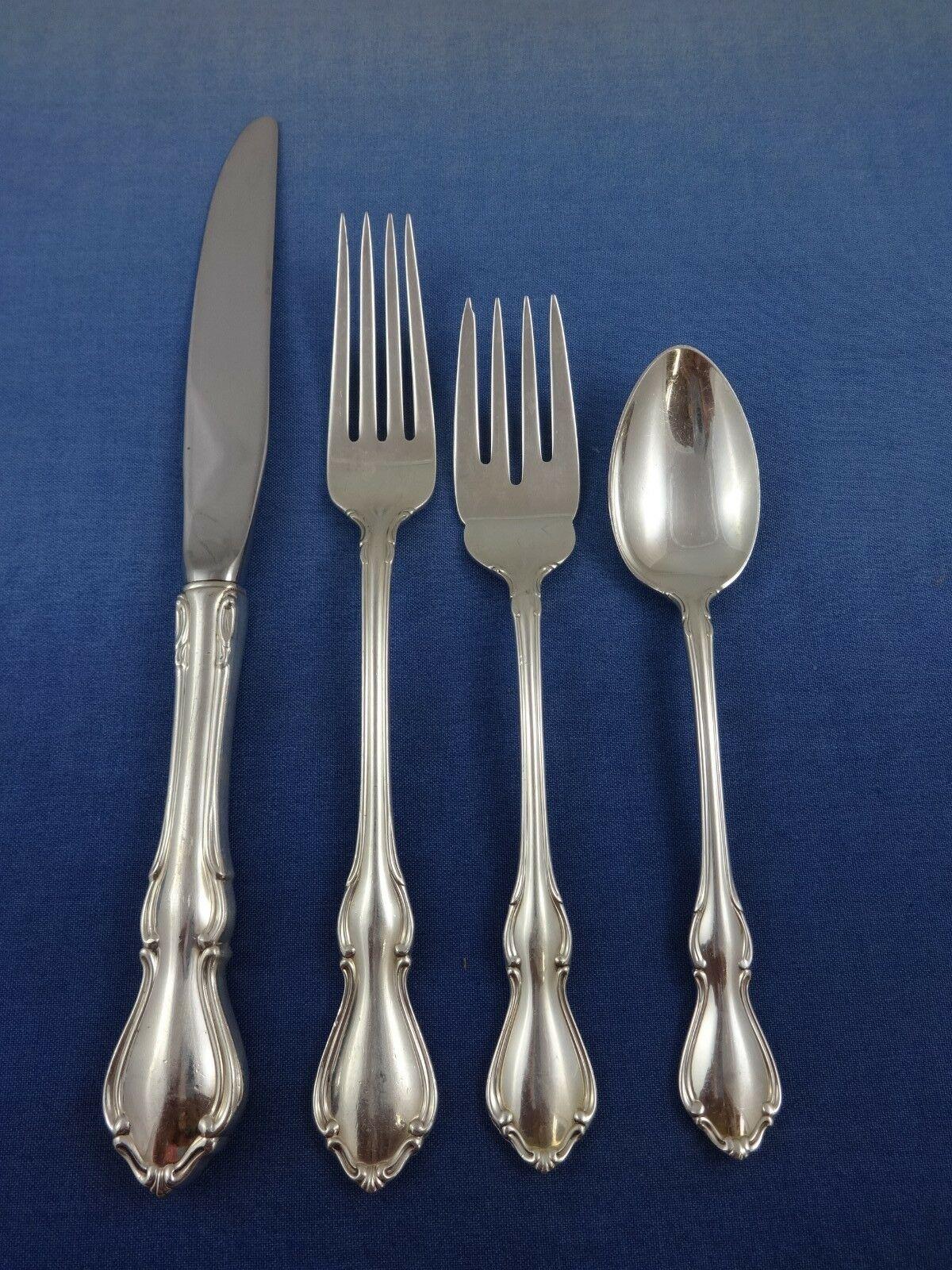 Hampton Court by Reed & Barton sterling silver Flatware set - 65 pieces. This set includes:

12 knives, 9 1/8