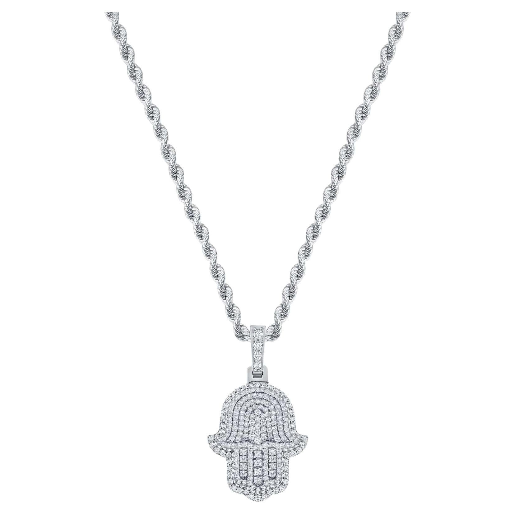 This Hamsa diamond necklace provides both a spiritual and fashionable on trend look.
 
Necklace Information
Metal : 14k Gold
Diamond Cut : Round
Total Diamond Carats : 2ttcw
Diamond Clarity : VS-SI
Diamond Color : F-G
Necklace Length : 18