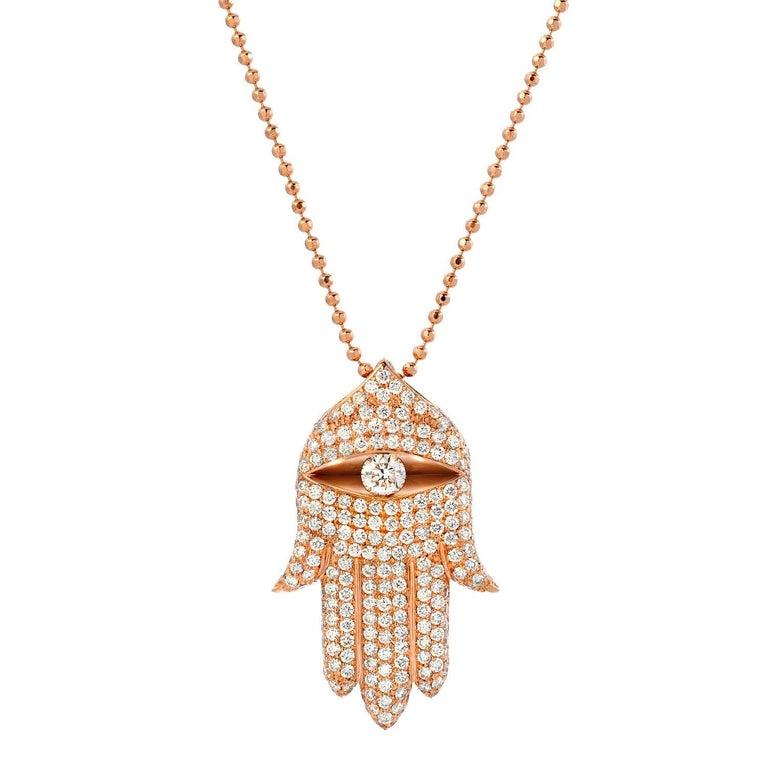 Diamond necklace featuring a rose gold diamond Hamsa, set with a total of 1.65ct round brilliant diamonds.
Hamsa measurements:
Length: Approx. 1 inch.
Width: Approx. 0.70 inches.
Chain length is 24 inches. Length can be adjusted upon request.