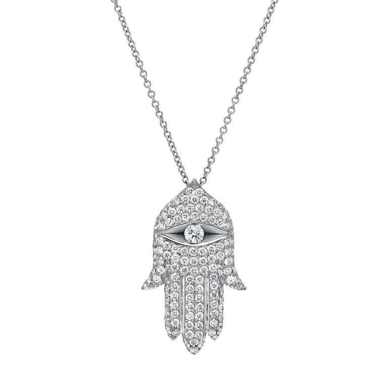 18K white gold diamond pendant Hamsa, set with a total of 1.15 carat round brilliant diamonds.
Length - 0.96 inches
Width - 0.54 inches
Chain length - 18