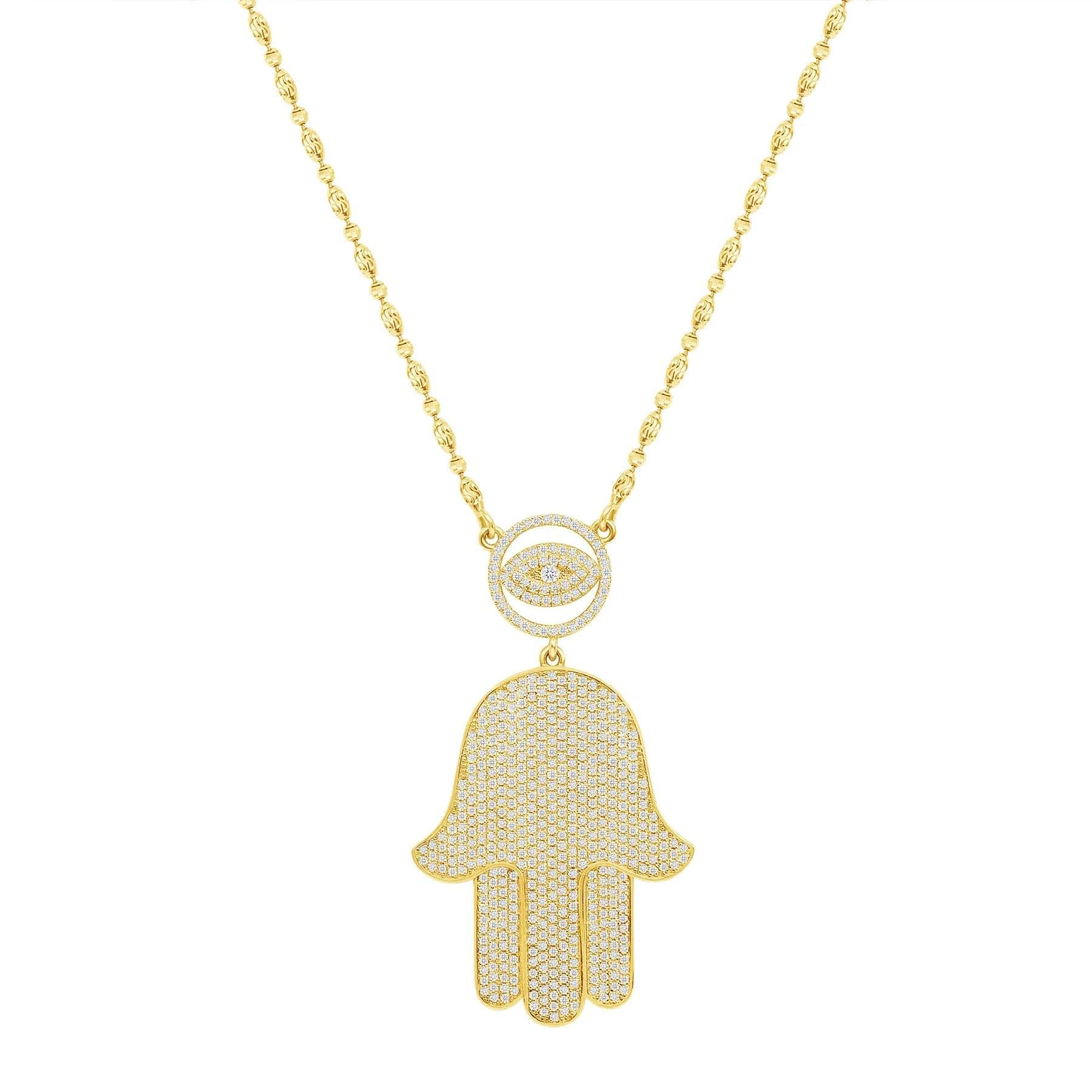 This Hamsa Eye Diamond Necklace provides both a spiritual and fashionable on trend look. A perfect gift for family members and friends.

Necklace Information
Metal : 14k Gold
Diamond Cut : Round
Total Diamond Carats : 1 Carat
Diamond Clarity :