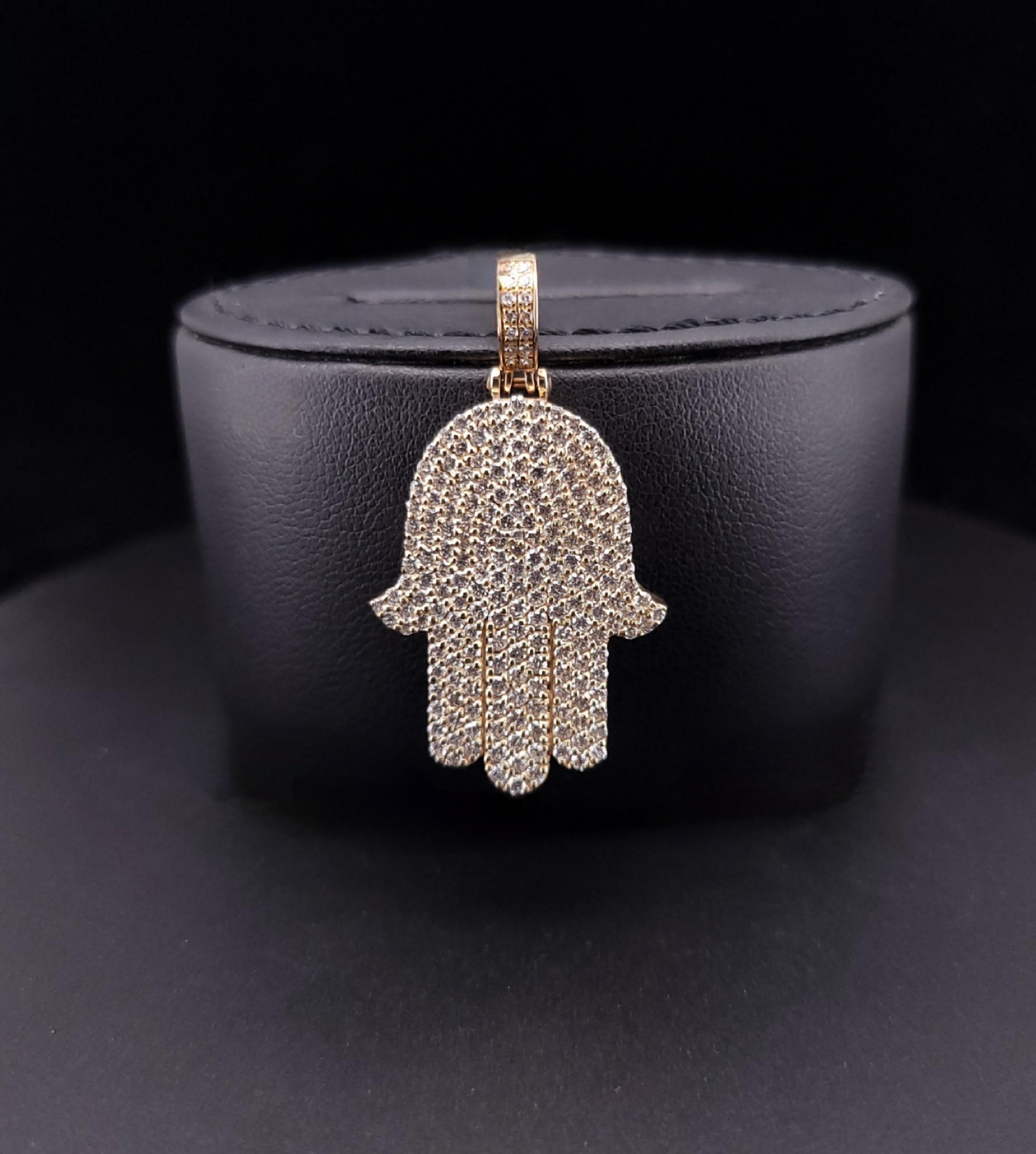 Hamsa hand pendant 14K Yellow Gold 2.5ct diamonds
for more info contact us

Material: 14K Yellow Gold
Diamonds: VS G 2.5 ct
Size: 30 mm(40 mm with bell) x 22 mm
Thickness: 4.00 mm

Retail price:5500$