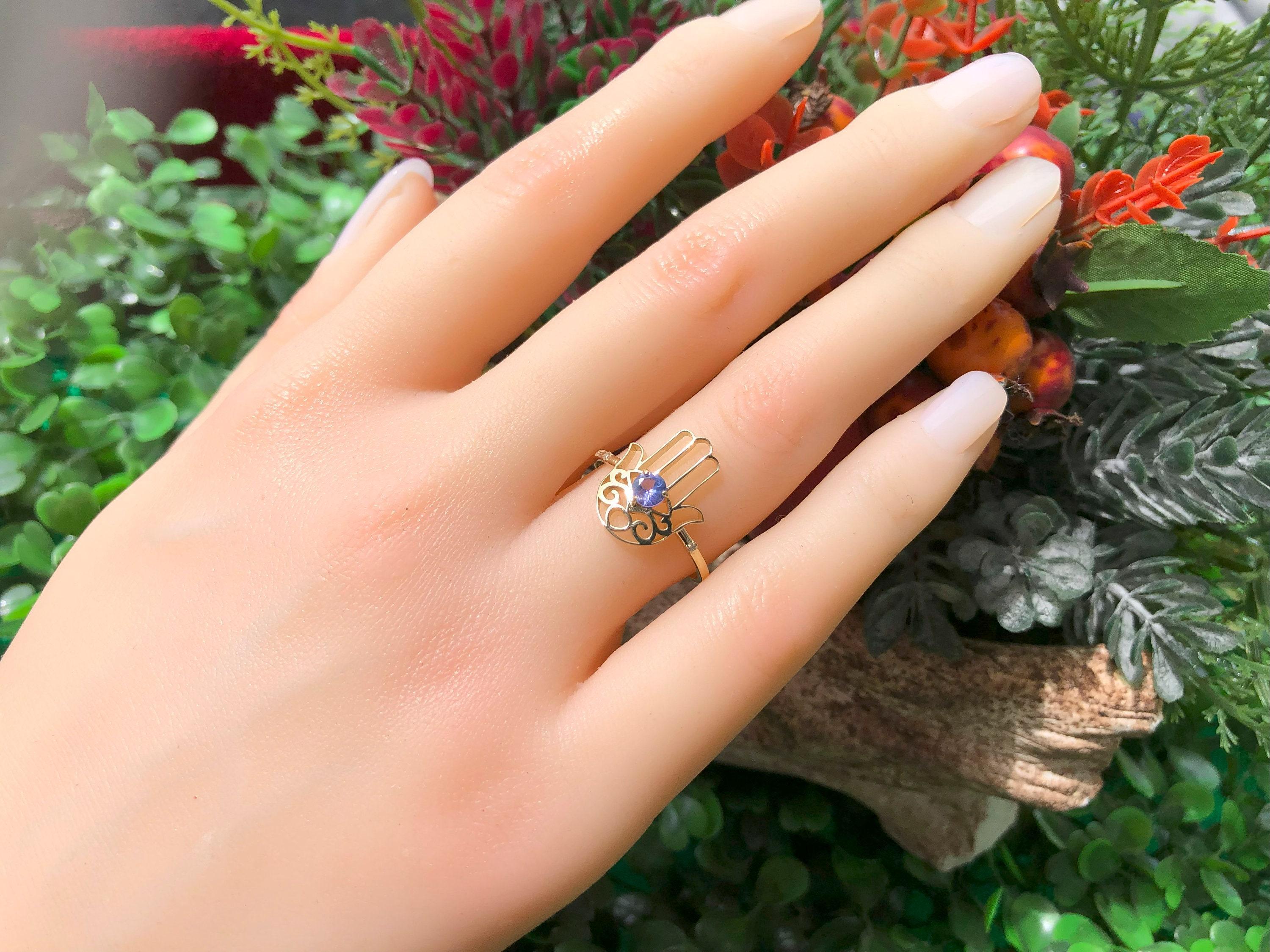 Hamsa Hand Tanzanite ring in 14k gold. Hand of Fatima gold Ring. Gold Protection Ring. December Birthstone ring. Round tanzanite gold ring. By Daizy Jewellery.

Metal: 14k gold
Weight: 2 g. depends from size

Central stone: Natural tanzanite - 1